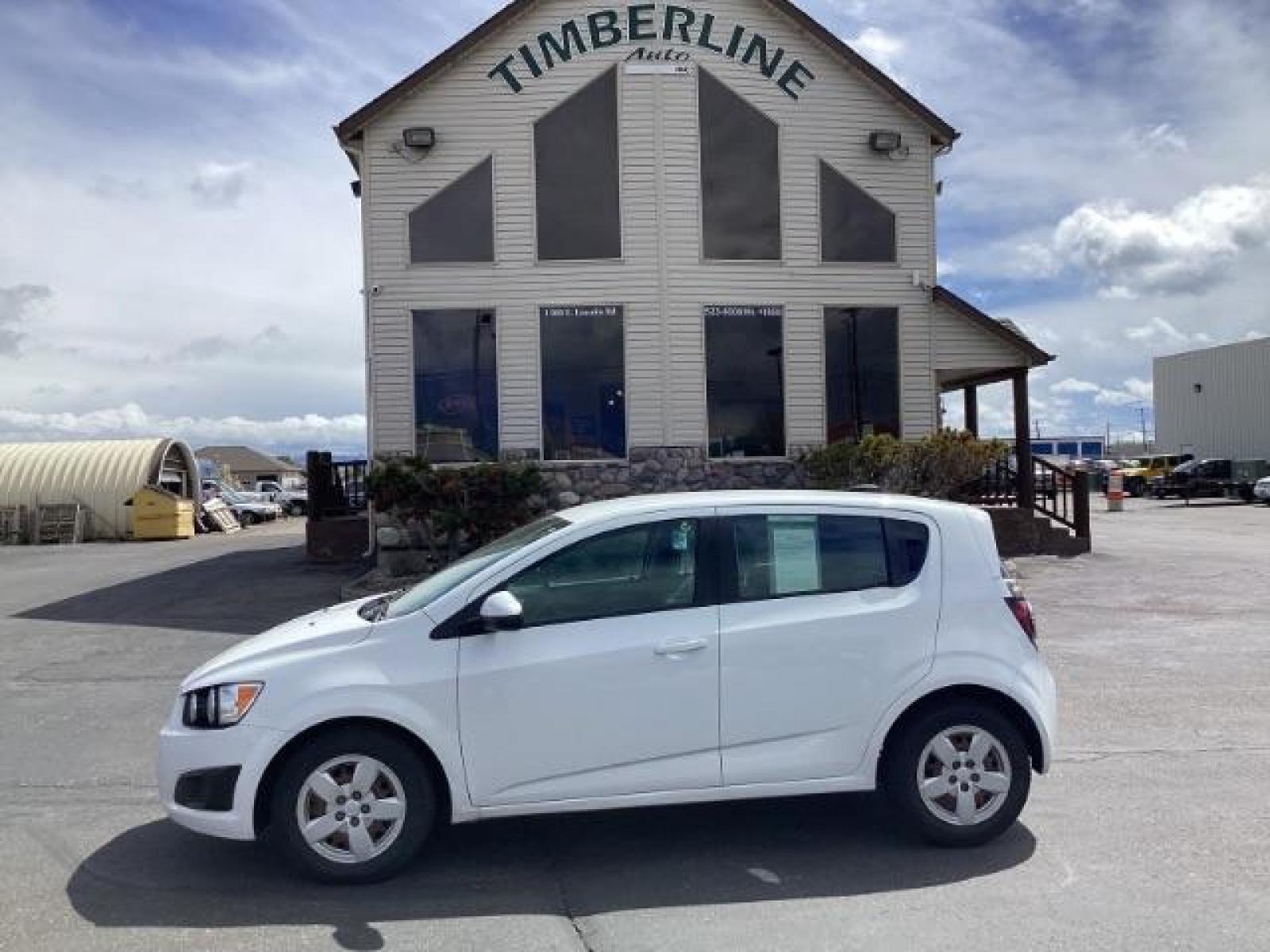 2016 Summit White Chevrolet Sonic LS Auto 5-Door (1G1JA6SH6G4) with an 1.8L L4 DOHC 24V engine, 6-Speed Automatic transmission, located at 1235 N Woodruff Ave., Idaho Falls, 83401, (208) 523-1053, 43.507172, -112.000488 - Photo #1