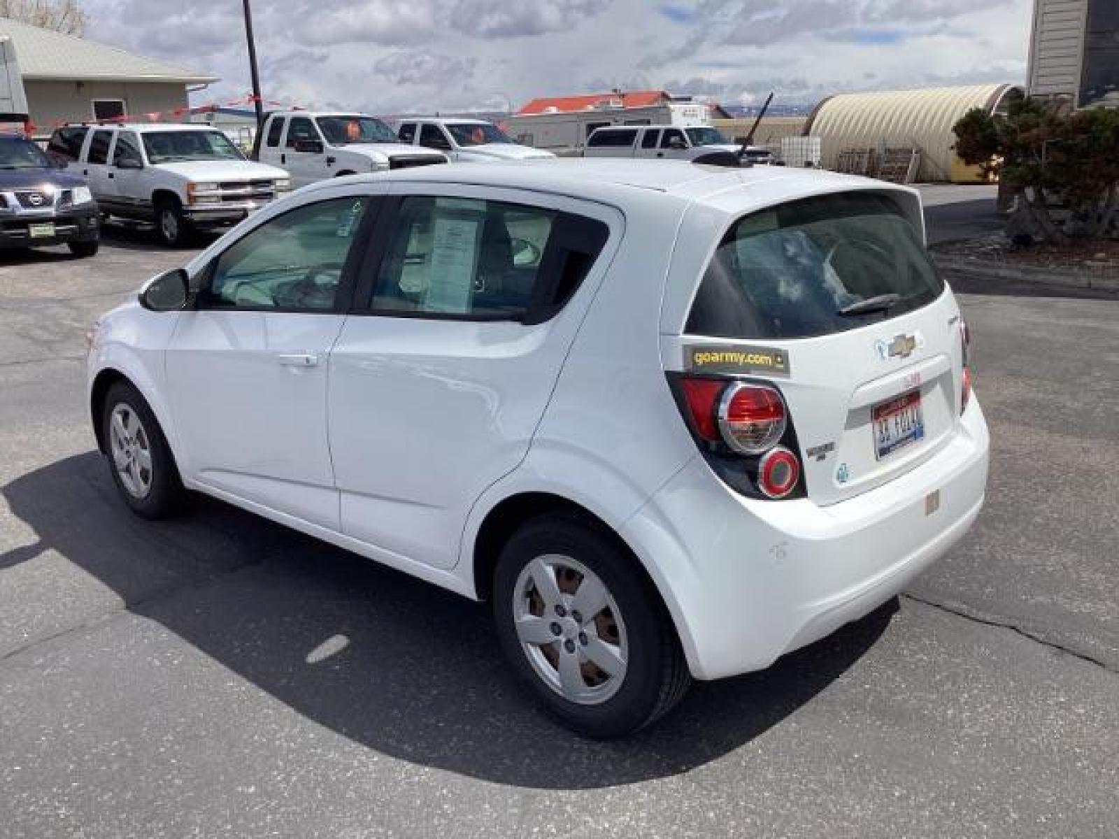 2016 Summit White Chevrolet Sonic LS Auto 5-Door (1G1JA6SH6G4) with an 1.8L L4 DOHC 24V engine, 6-Speed Automatic transmission, located at 1235 N Woodruff Ave., Idaho Falls, 83401, (208) 523-1053, 43.507172, -112.000488 - The 2016 Chevy Sonic LS is a compact car known for its fuel efficiency, nimble handling, and decent amount of standard features. Here's an overview of its key features: Engine Options: The Sonic LS typically comes with a 1.8-liter four-cylinder engine, although some models may have a turbocharged 1 - Photo #2