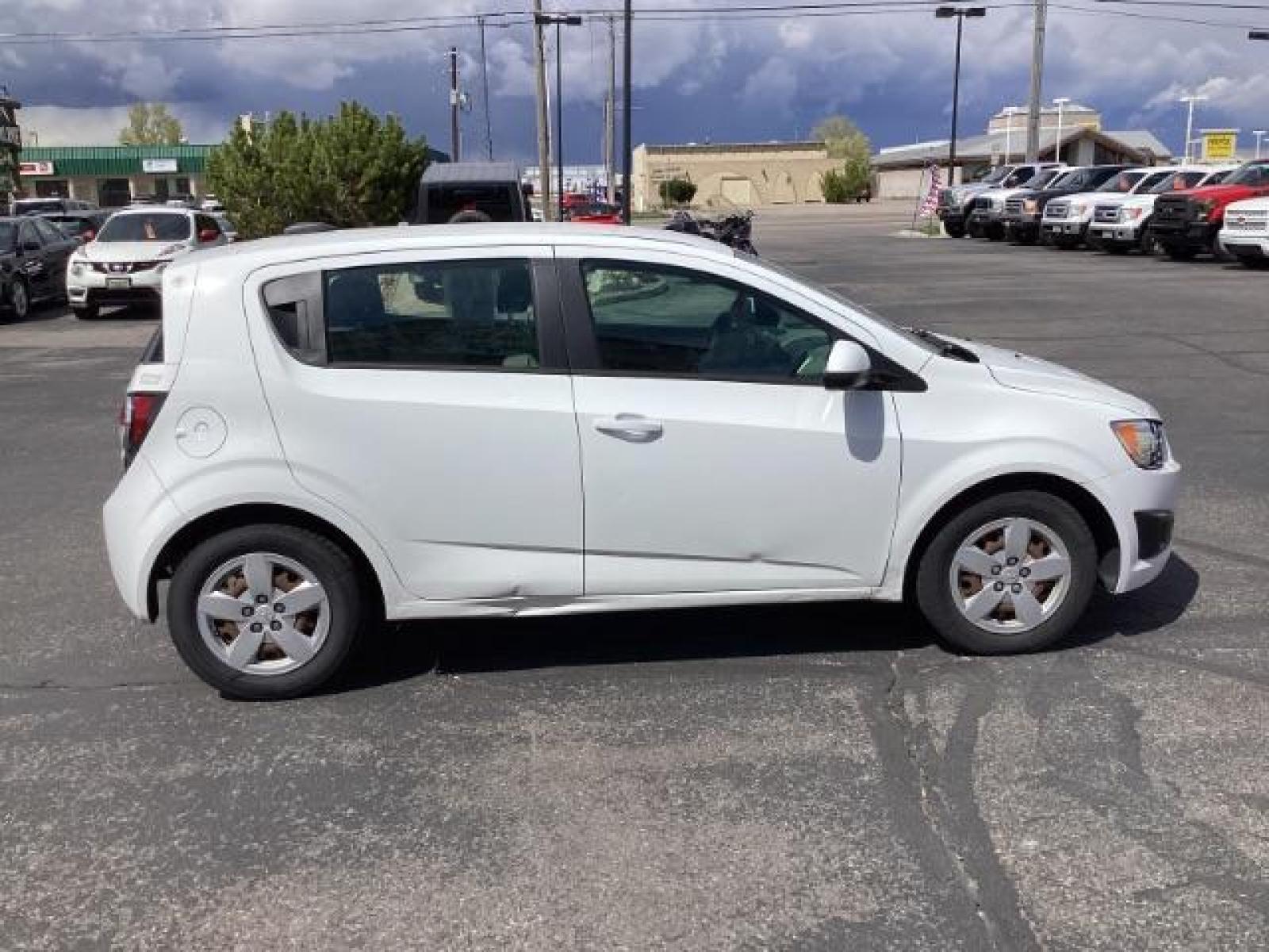 2016 Summit White Chevrolet Sonic LS Auto 5-Door (1G1JA6SH6G4) with an 1.8L L4 DOHC 24V engine, 6-Speed Automatic transmission, located at 1235 N Woodruff Ave., Idaho Falls, 83401, (208) 523-1053, 43.507172, -112.000488 - Photo #5