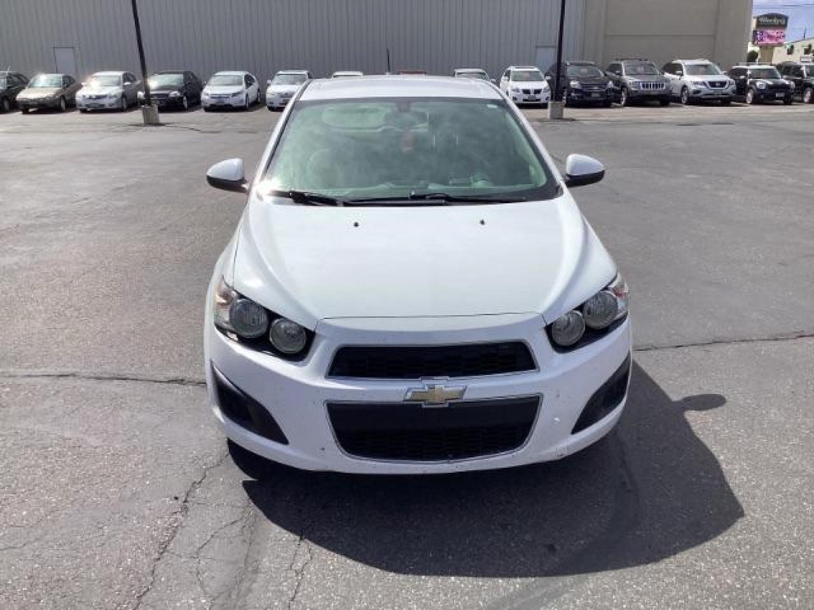 2016 Summit White Chevrolet Sonic LS Auto 5-Door (1G1JA6SH6G4) with an 1.8L L4 DOHC 24V engine, 6-Speed Automatic transmission, located at 1235 N Woodruff Ave., Idaho Falls, 83401, (208) 523-1053, 43.507172, -112.000488 - Photo #7