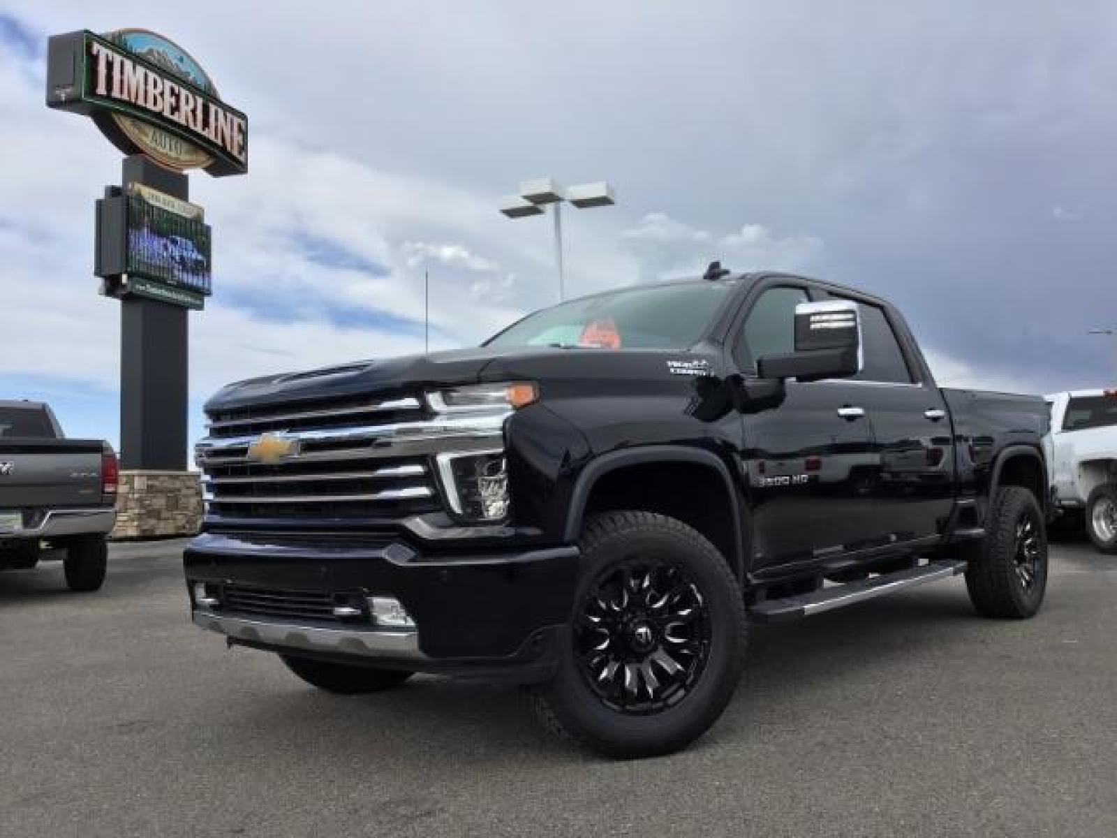 2022 Black /Jet Black Chevrolet Silverado 3500HD High Country Crew Cab 4WD (1GC4YVEY5NF) with an 6.6L V8 OHV 32V TURBO DIESEL engine, 6-Speed Automatic transmission, located at 1235 N Woodruff Ave., Idaho Falls, 83401, (208) 523-1053, 43.507172, -112.000488 - 2022 Chevrolet Silverado 3500HD High Country, 6.6L Duramax turbo diesel! This truck comes with aftermarket 20 inch FUEL BLITZ wheels wrapped in near new DYNAPRO AT2 tires. At Timberline Auto it is always easy to find a great deal on your next vehicle! Our experienced sales staff can help find the r - Photo #0
