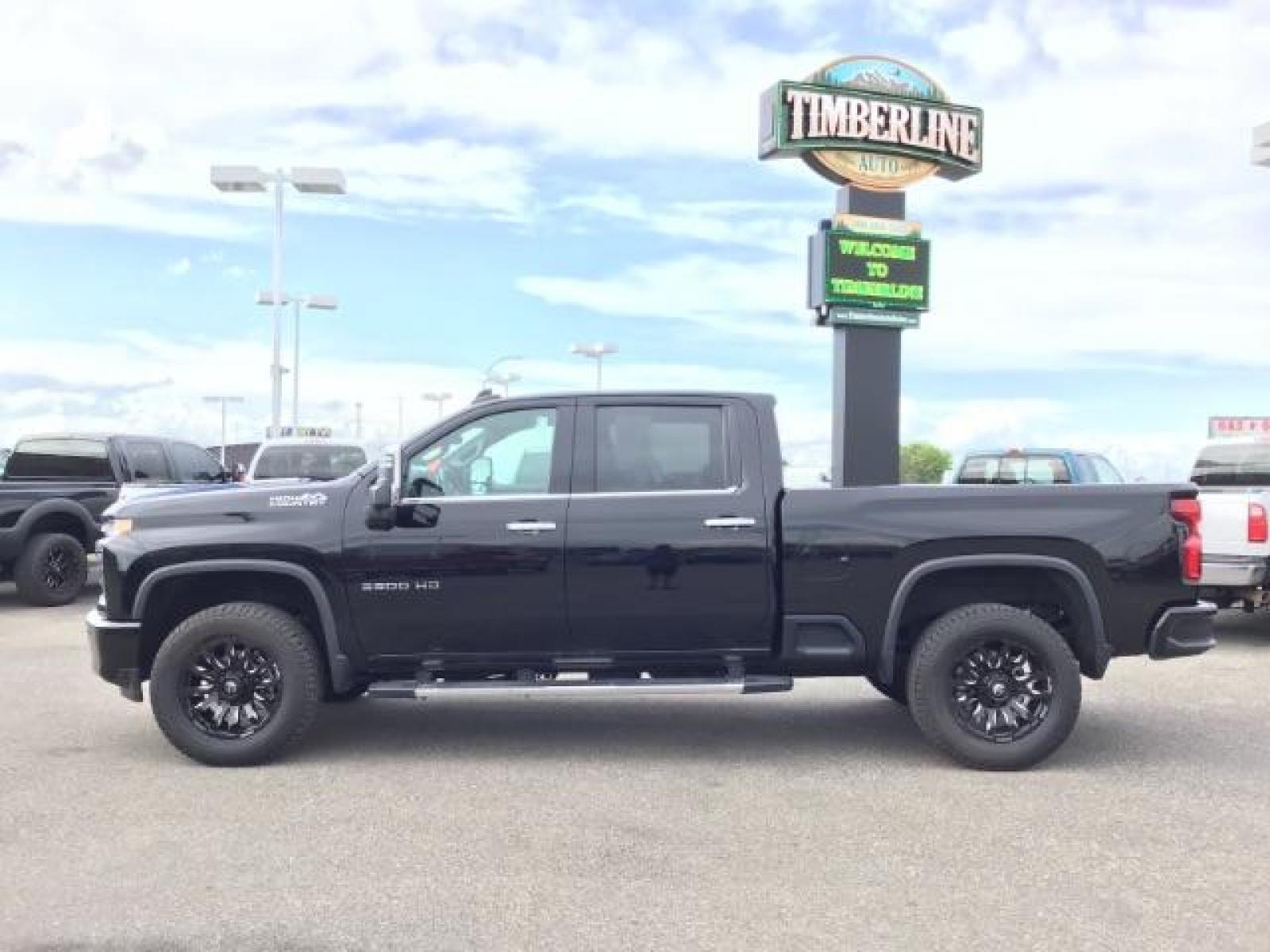 2022 Black /Jet Black Chevrolet Silverado 3500HD High Country Crew Cab 4WD (1GC4YVEY5NF) with an 6.6L V8 OHV 32V TURBO DIESEL engine, 6-Speed Automatic transmission, located at 1235 N Woodruff Ave., Idaho Falls, 83401, (208) 523-1053, 43.507172, -112.000488 - 2022 Chevrolet Silverado 3500HD High Country, 6.6L Duramax turbo diesel! This truck comes with aftermarket 20 inch FUEL BLITZ wheels wrapped in near new DYNAPRO AT2 tires. At Timberline Auto it is always easy to find a great deal on your next vehicle! Our experienced sales staff can help find the r - Photo #1