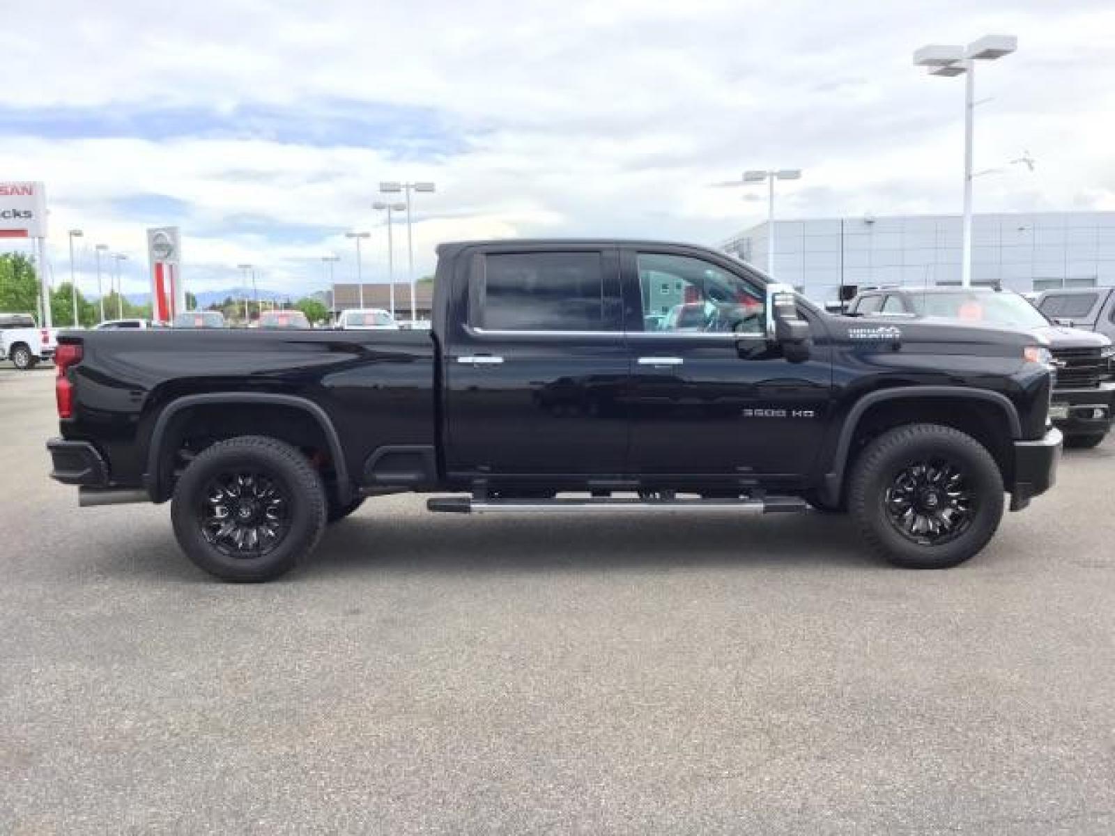 2022 Black /Jet Black Chevrolet Silverado 3500HD High Country Crew Cab 4WD (1GC4YVEY5NF) with an 6.6L V8 OHV 32V TURBO DIESEL engine, 6-Speed Automatic transmission, located at 1235 N Woodruff Ave., Idaho Falls, 83401, (208) 523-1053, 43.507172, -112.000488 - 2022 Chevrolet Silverado 3500HD High Country, 6.6L Duramax turbo diesel! This truck comes with aftermarket 20 inch FUEL BLITZ wheels wrapped in near new DYNAPRO AT2 tires. At Timberline Auto it is always easy to find a great deal on your next vehicle! Our experienced sales staff can help find the r - Photo #7