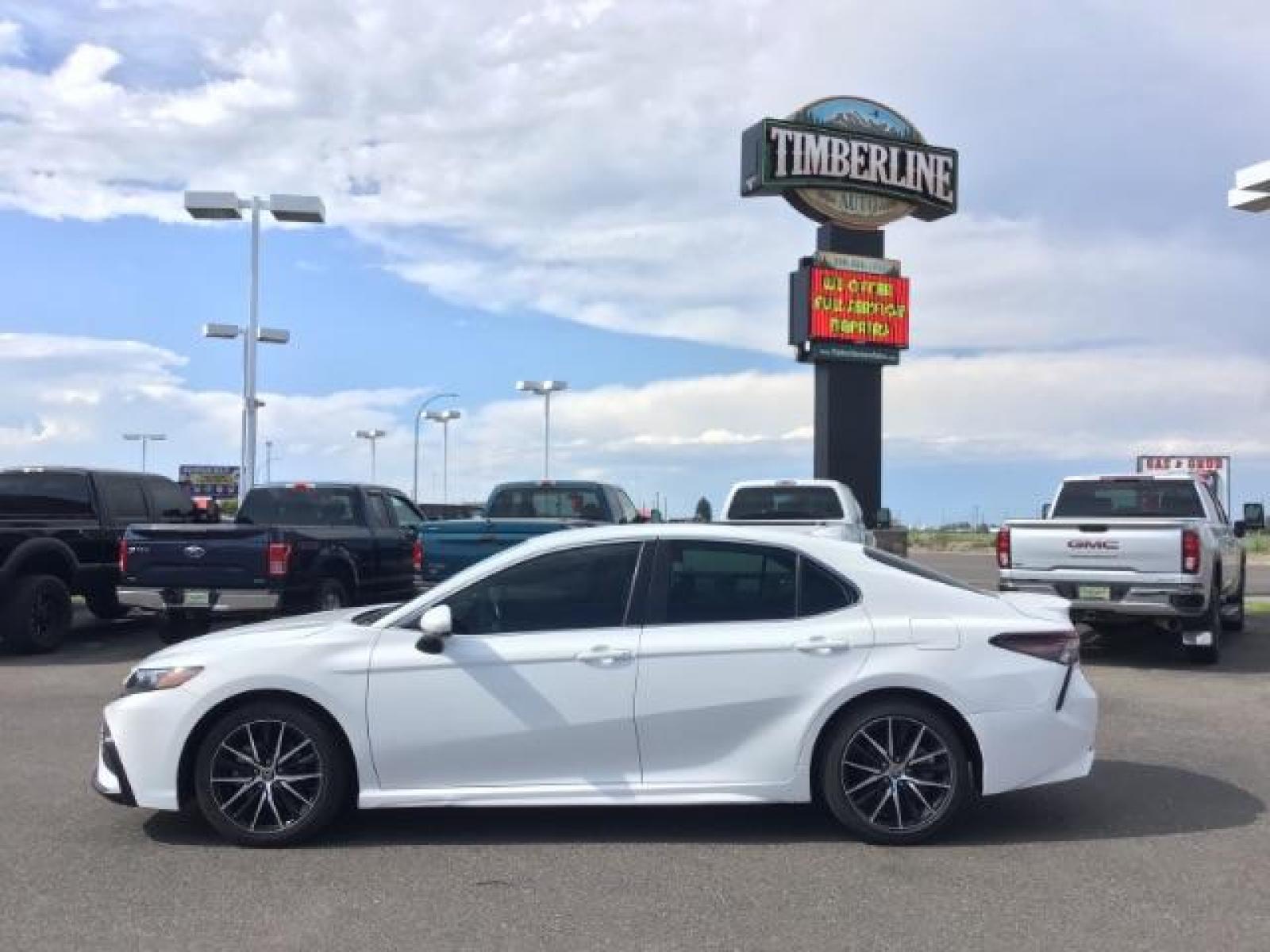 2021 Super White /Ash, leatherette/cloth Toyota Camry SE (4T1G11AKXMU) with an 2.5L L4 DOHC 16V engine, 8-Speed Automatic transmission, located at 1235 N Woodruff Ave., Idaho Falls, 83401, (208) 523-1053, 43.507172, -112.000488 - This is a very roomy full sized sedan offering many options including but not limited to front collision sensors, a backup camera with guide lines, and phone projection. This vehicle is in brand new condition at a used price! At Timberline Auto it is always easy to find a great deal on your next veh - Photo #2