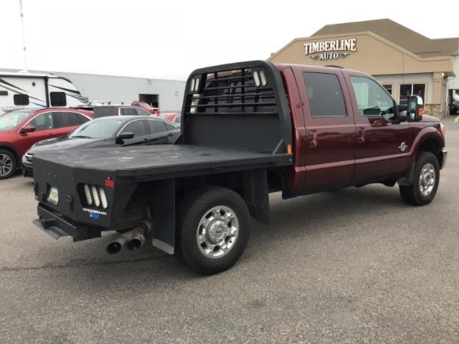 2012 MAROON /Black Leather Interior Ford F-350 SD Lariat Crew Cab 4WD (1FT8W3BTXCE) with an 6.7L V8 OHV 16V DIESEL engine, 6-Speed Automatic transmission, located at 1235 N Woodruff Ave., Idaho Falls, 83401, (208) 523-1053, 43.507172, -112.000488 - This 2012 F350 Lariat, has the 6.7L motor. Only has 103,372 miles. It is a flat bed. It comes with black leather seats, sunroof, navigation, heated and cooled seats,, and the exterior and interior are in great condition. At Timberline Auto it is always easy to find a great deal on your next vehicle - Photo #4