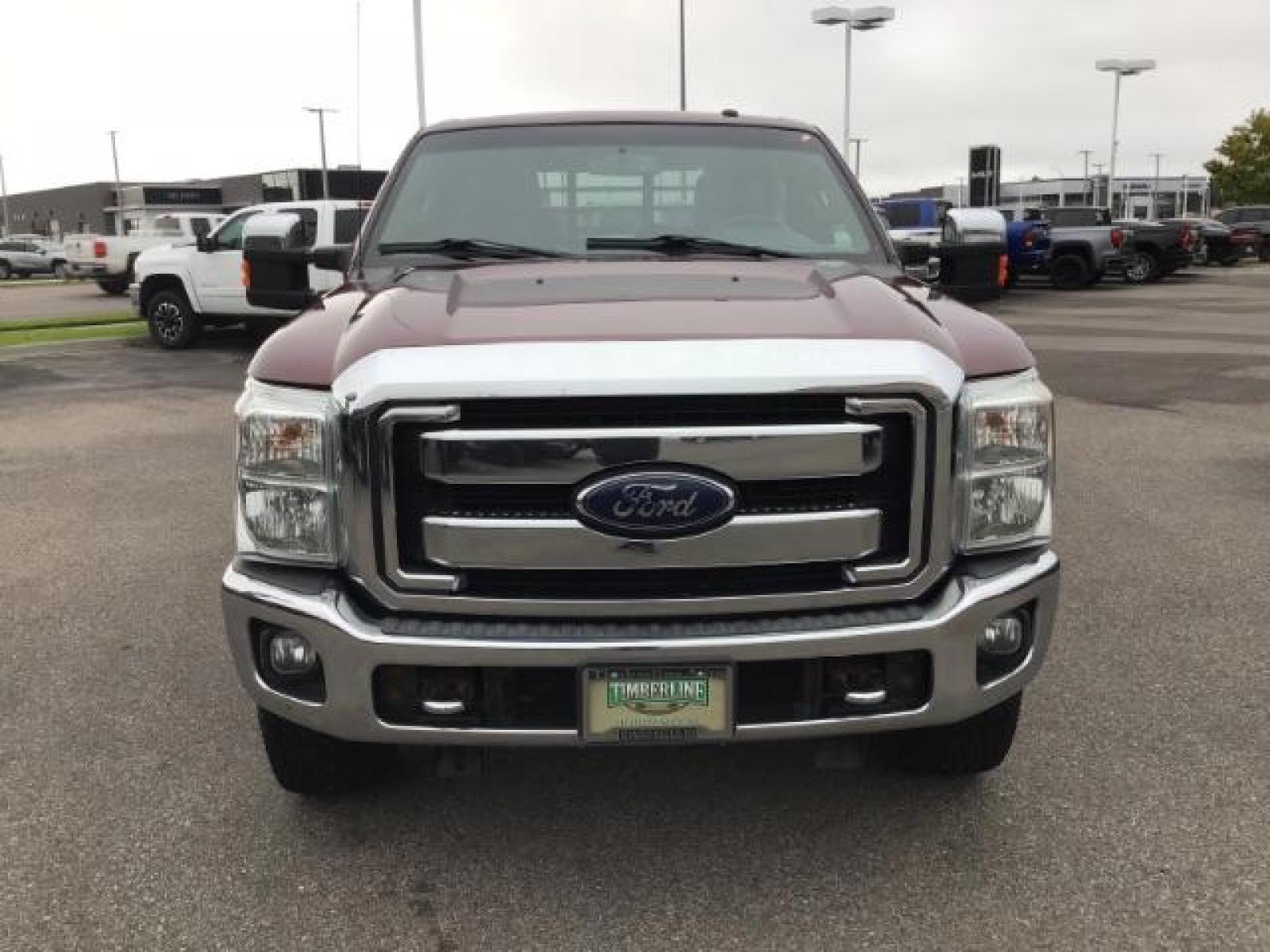 2012 MAROON /Black Leather Interior Ford F-350 SD Lariat Crew Cab 4WD (1FT8W3BTXCE) with an 6.7L V8 OHV 16V DIESEL engine, 6-Speed Automatic transmission, located at 1235 N Woodruff Ave., Idaho Falls, 83401, (208) 523-1053, 43.507172, -112.000488 - This 2012 F350 Lariat, has the 6.7L motor. Only has 103,372 miles. It is a flat bed. It comes with black leather seats, sunroof, navigation, heated and cooled seats,, and the exterior and interior are in great condition. At Timberline Auto it is always easy to find a great deal on your next vehicle - Photo #7