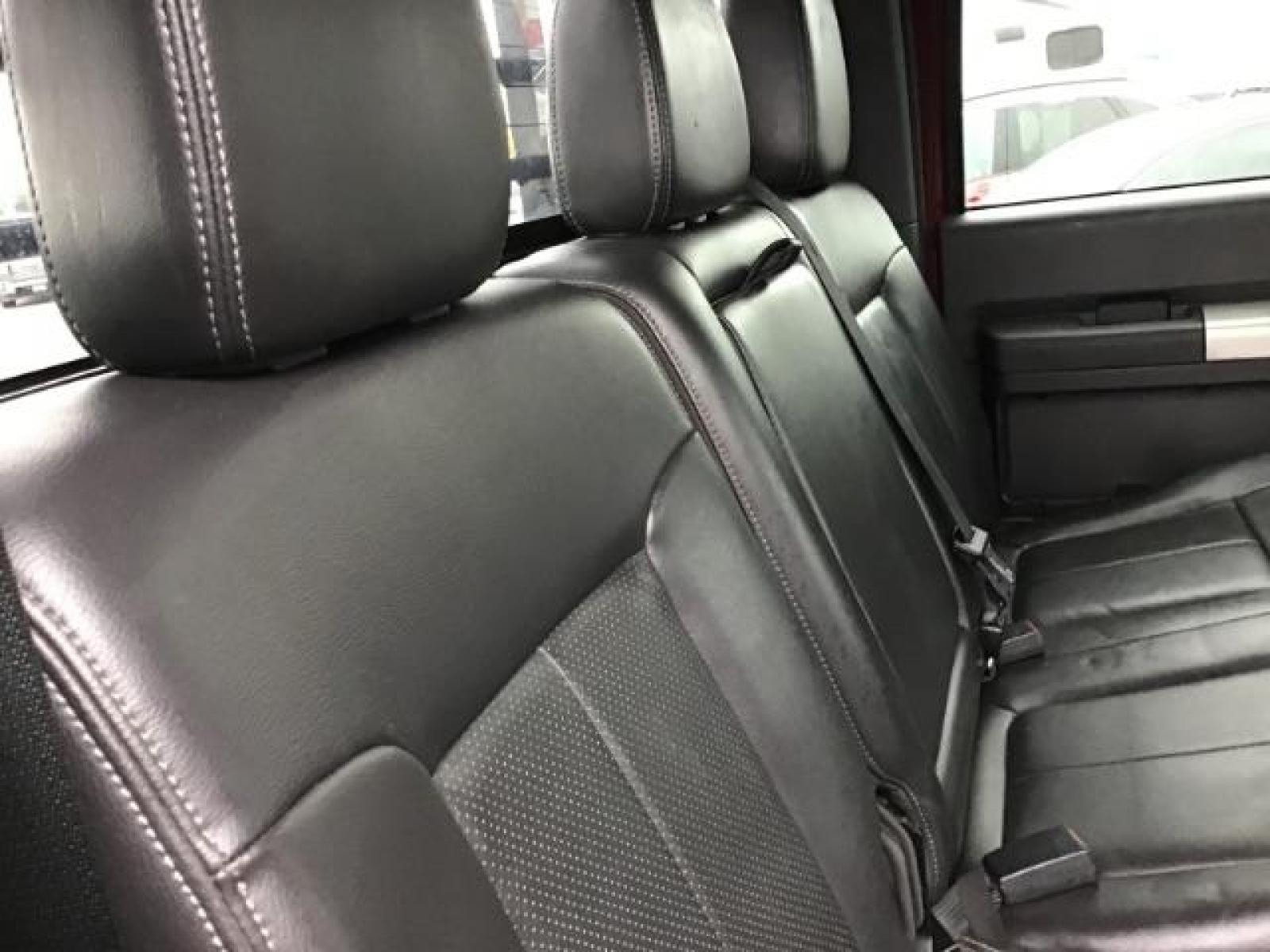 2012 MAROON /Black Leather Interior Ford F-350 SD Lariat Crew Cab 4WD (1FT8W3BTXCE) with an 6.7L V8 OHV 16V DIESEL engine, 6-Speed Automatic transmission, located at 1235 N Woodruff Ave., Idaho Falls, 83401, (208) 523-1053, 43.507172, -112.000488 - This 2012 F350 Lariat, has the 6.7L motor. Only has 103,372 miles. It is a flat bed. It comes with black leather seats, sunroof, navigation, heated and cooled seats,, and the exterior and interior are in great condition. At Timberline Auto it is always easy to find a great deal on your next vehicle - Photo #22