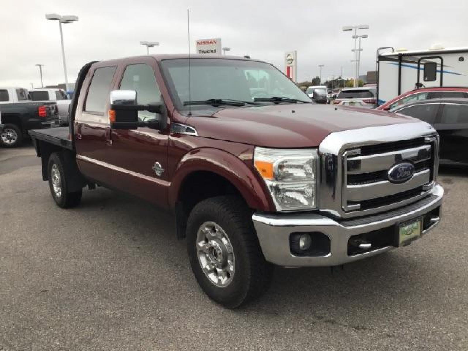 2012 MAROON /Black Leather Interior Ford F-350 SD Lariat Crew Cab 4WD (1FT8W3BTXCE) with an 6.7L V8 OHV 16V DIESEL engine, 6-Speed Automatic transmission, located at 1235 N Woodruff Ave., Idaho Falls, 83401, (208) 523-1053, 43.507172, -112.000488 - This 2012 F350 Lariat, has the 6.7L motor. Only has 103,372 miles. It is a flat bed. It comes with black leather seats, sunroof, navigation, heated and cooled seats,, and the exterior and interior are in great condition. At Timberline Auto it is always easy to find a great deal on your next vehicle - Photo #6