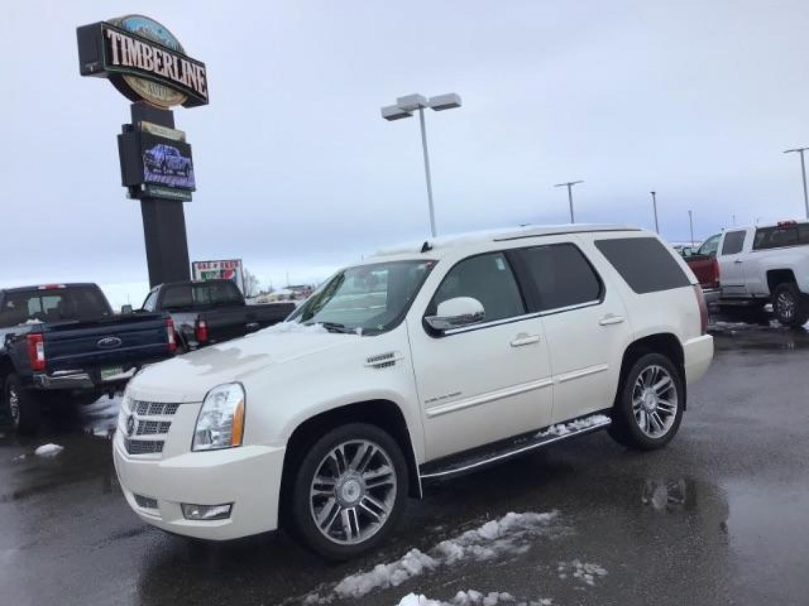 2012 WHITE /WHITE Cadillac Escalade AWD Luxury (1GYS4BEF2CR) with an 6.2L V8 OHV 16V FFV engine, 6-Speed Automatic transmission, located at 1235 N Woodruff Ave., Idaho Falls, 83401, (208) 523-1053, 43.507172, -112.000488 - This 2012 Cadillac Escalade Luxury 4x4, has the 6.2L motor. It has 117,000 miles. Comes with leather interior, heated seats, 3rd row seating, blue tooth audio, sunroof, power seats, and back up camera. At Timberline Auto it is always easy to find a great deal on your next vehicle! Our experienced sa - Photo #0