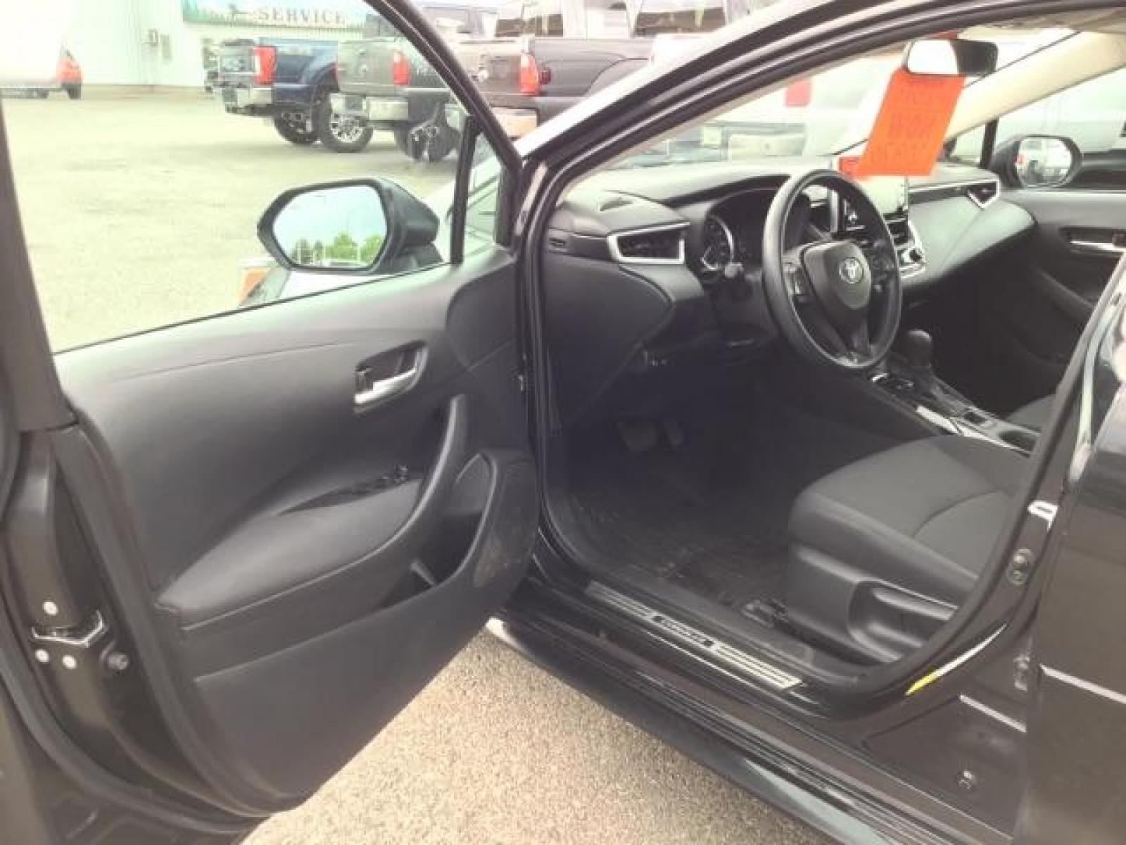 2021 BLACK /Black, cloth Toyota Corolla LE (5YFEPMAE1MP) with an 1.8L L4 DOHC 16V engine, Automatic transmission, located at 1235 N Woodruff Ave., Idaho Falls, 83401, (208) 523-1053, 43.507172, -112.000488 - This 2021 Toyota Corolla LE is in as good of shape as the day it rolled off the lot! Inside, outside, and mechanically it is in amazing condition! This one comes with a large touch screen display, rubber floor mats in the front, near new tires with 95% tread left, steering wheel mounted controls, la - Photo #9