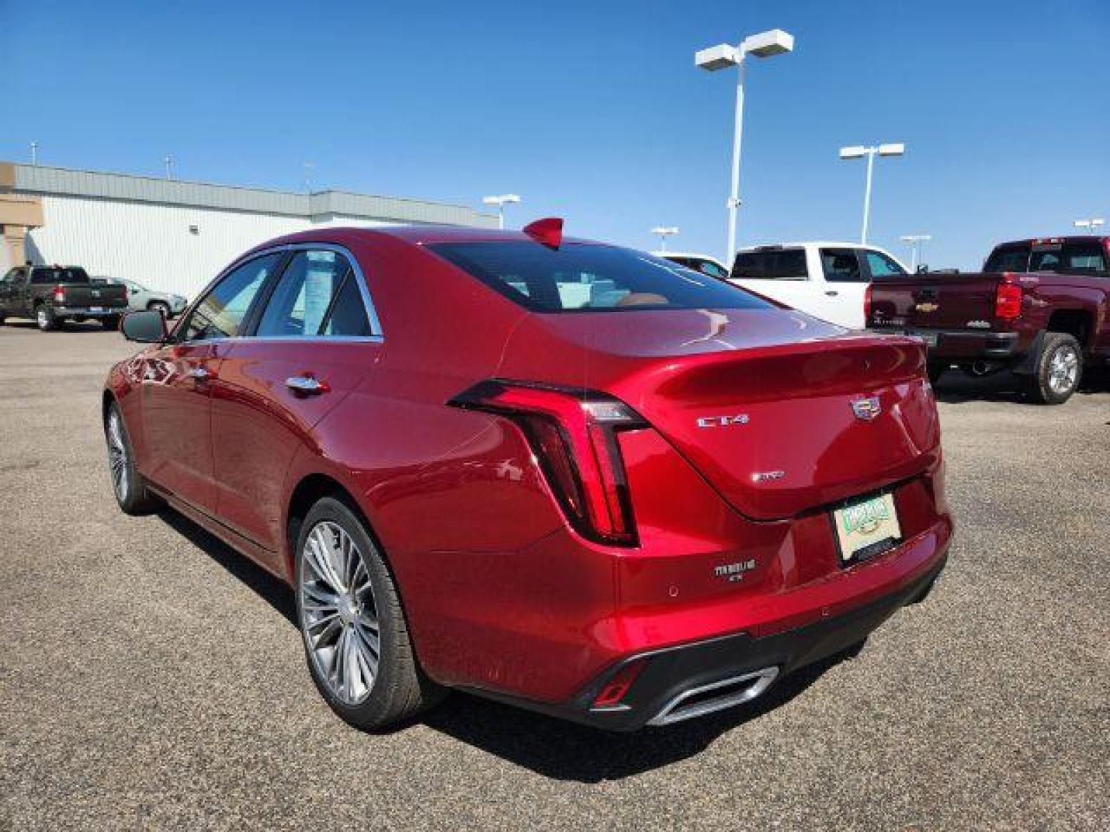 2022 Infrared Tintcoat /Cinnamon w/Jet Black Accents Cadillac CT4 Premium Luxury (1G6DF5RL7N0) with an 2.7L L4 DOHC 16V TURBO engine, 8-Speed Automatic transmission, located at 1235 N Woodruff Ave., Idaho Falls, 83401, (208) 523-1053, 43.507172, -112.000488 - Wow, just wow!! This is one really nice car! It will check all the boxes- fuel efficient, powerful, AWD, comfortable, luxurious, great looking, roomy, fun to drive, the list goes on and on! It has all the driver safety options, heads up display, adjustable driving specs, navigation, Apple car play, - Photo #3