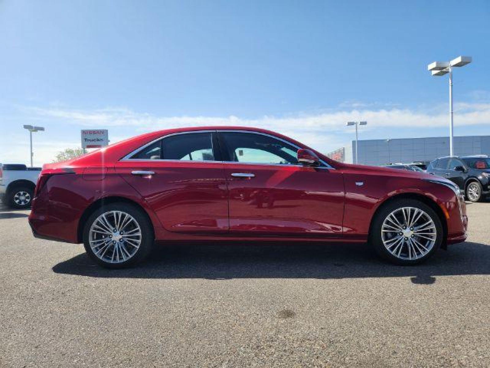 2022 Infrared Tintcoat /Cinnamon w/Jet Black Accents Cadillac CT4 Premium Luxury (1G6DF5RL7N0) with an 2.7L L4 DOHC 16V TURBO engine, 8-Speed Automatic transmission, located at 1235 N Woodruff Ave., Idaho Falls, 83401, (208) 523-1053, 43.507172, -112.000488 - Wow, just wow!! This is one really nice car! It will check all the boxes- fuel efficient, powerful, AWD, comfortable, luxurious, great looking, roomy, fun to drive, the list goes on and on! It has all the driver safety options, heads up display, adjustable driving specs, navigation, Apple car play, - Photo #6