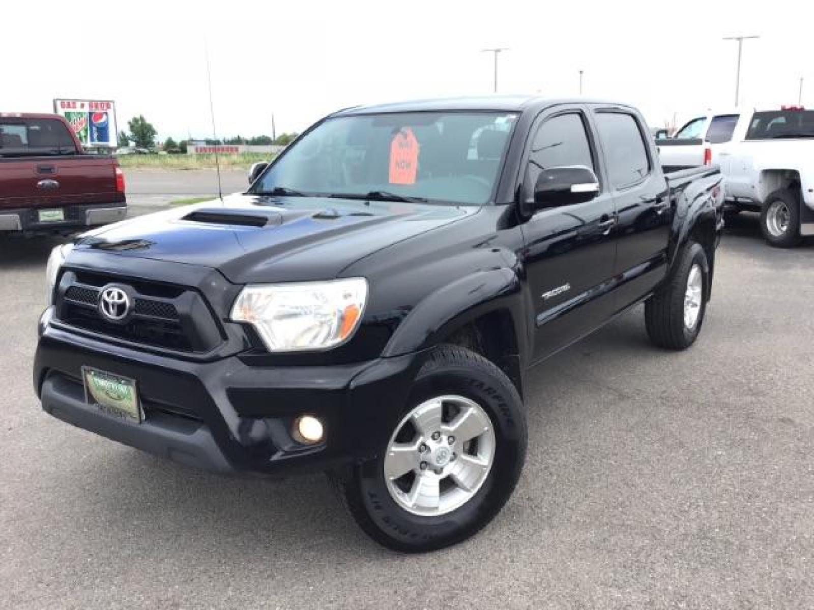 2015 Black /Gray, cloth Toyota Tacoma TRD SPORT Double Cab (3TMLU4EN8FM) with an 4.0L V6 DOHC 24V engine, Automatic transmission, located at 1235 N Woodruff Ave., Idaho Falls, 83401, (208) 523-1053, 43.507172, -112.000488 - Here's your chance at one of the most popular vehicles on the market! This Tacoma is in great shape inside and out! The TRD-SPORT gives you the color matched bumpers, the bigger display, and a few other goodies! The bed has a factory liner and the interior has rubber floor mats in the front with clo - Photo #1