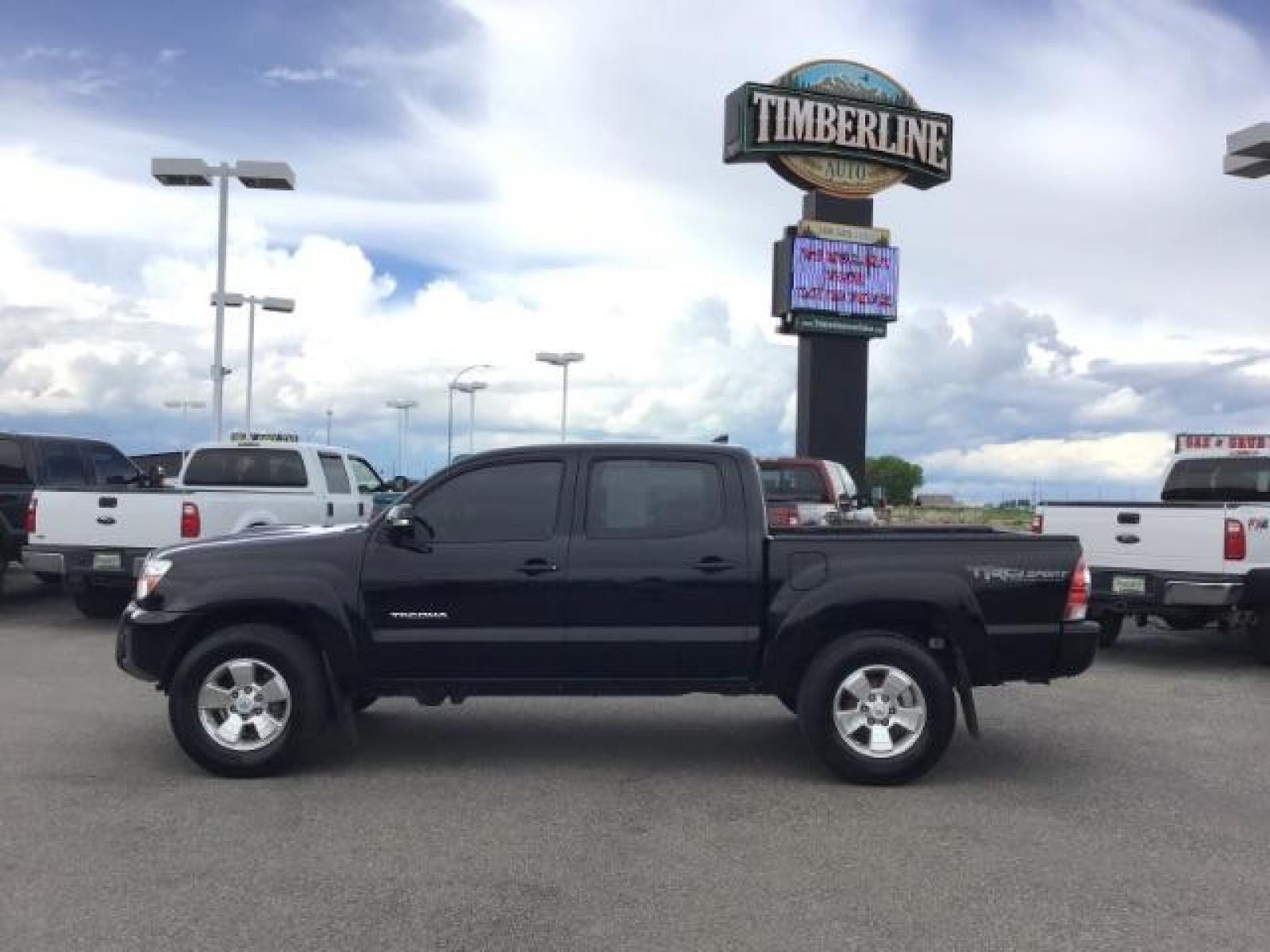 2015 Black /Gray, cloth Toyota Tacoma TRD SPORT Double Cab (3TMLU4EN8FM) with an 4.0L V6 DOHC 24V engine, Automatic transmission, located at 1235 N Woodruff Ave., Idaho Falls, 83401, (208) 523-1053, 43.507172, -112.000488 - Here's your chance at one of the most popular vehicles on the market! This Tacoma is in great shape inside and out! The TRD-SPORT gives you the color matched bumpers, the bigger display, and a few other goodies! The bed has a factory liner and the interior has rubber floor mats in the front with clo - Photo #2