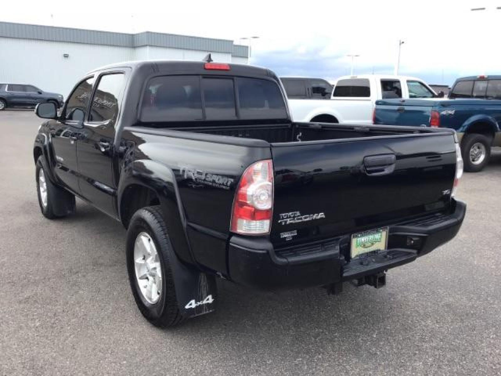 2015 Black /Gray, cloth Toyota Tacoma TRD SPORT Double Cab (3TMLU4EN8FM) with an 4.0L V6 DOHC 24V engine, Automatic transmission, located at 1235 N Woodruff Ave., Idaho Falls, 83401, (208) 523-1053, 43.507172, -112.000488 - Here's your chance at one of the most popular vehicles on the market! This Tacoma is in great shape inside and out! The TRD-SPORT gives you the color matched bumpers, the bigger display, and a few other goodies! The bed has a factory liner and the interior has rubber floor mats in the front with clo - Photo #3