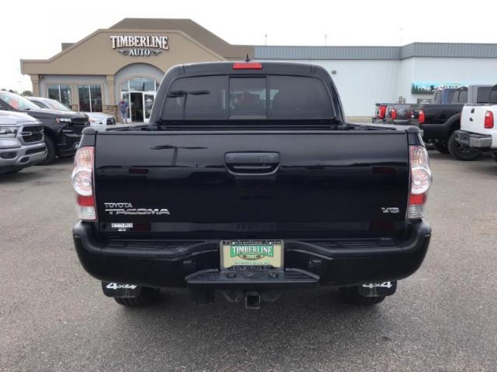 2015 Black /Gray, cloth Toyota Tacoma TRD SPORT Double Cab (3TMLU4EN8FM) with an 4.0L V6 DOHC 24V engine, Automatic transmission, located at 1235 N Woodruff Ave., Idaho Falls, 83401, (208) 523-1053, 43.507172, -112.000488 - Here's your chance at one of the most popular vehicles on the market! This Tacoma is in great shape inside and out! The TRD-SPORT gives you the color matched bumpers, the bigger display, and a few other goodies! The bed has a factory liner and the interior has rubber floor mats in the front with clo - Photo #4