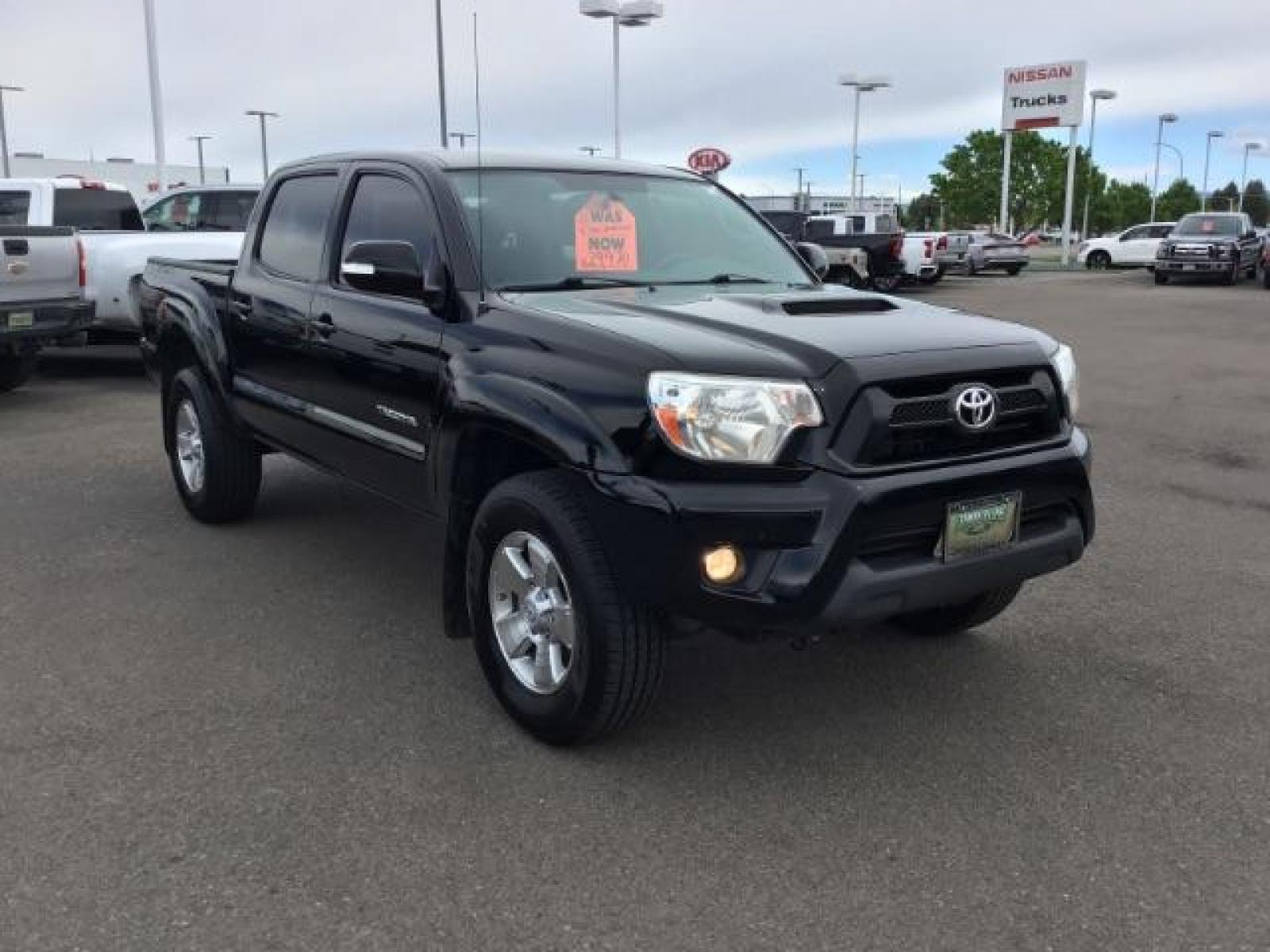 2015 Black /Gray, cloth Toyota Tacoma TRD SPORT Double Cab (3TMLU4EN8FM) with an 4.0L V6 DOHC 24V engine, Automatic transmission, located at 1235 N Woodruff Ave., Idaho Falls, 83401, (208) 523-1053, 43.507172, -112.000488 - Here's your chance at one of the most popular vehicles on the market! This Tacoma is in great shape inside and out! The TRD-SPORT gives you the color matched bumpers, the bigger display, and a few other goodies! The bed has a factory liner and the interior has rubber floor mats in the front with clo - Photo #7