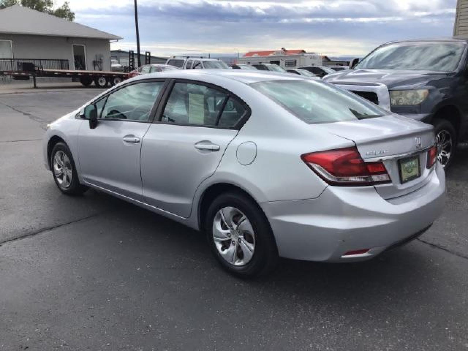 2013 Urban Titanium Metallic /Stone Cloth Interior Honda Civic LX Sedan 5-Speed AT (19XFB2F52DE) with an 1.8L L4 SOHC 16V engine, 5-Speed Automatic transmission, located at 1235 N Woodruff Ave., Idaho Falls, 83401, (208) 523-1053, 43.507172, -112.000488 - At Timberline Auto it is always easy to find a great deal on your next vehicle! Our experienced sales staff can help find the right vehicle will fit your needs. Our knowledgeable finance department has options for almost any credit score. We offer many warranty contract options to protect you new pr - Photo #2