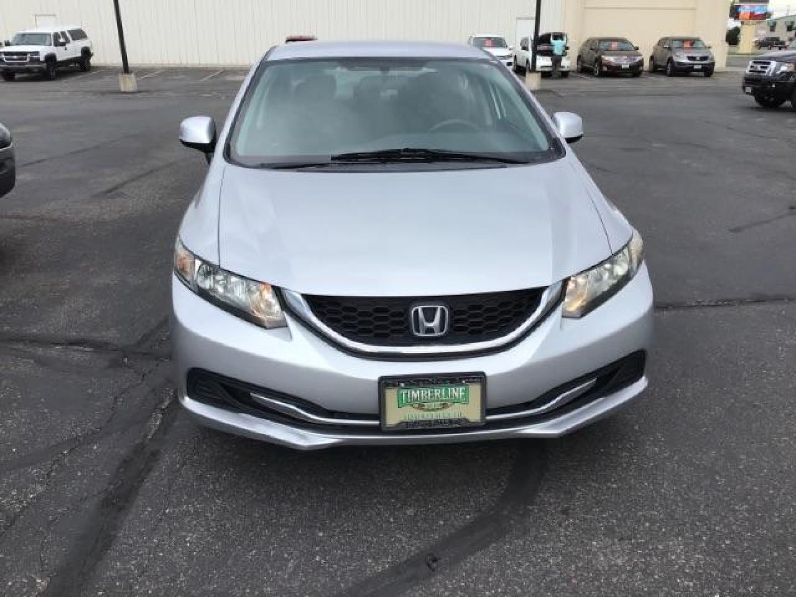 2013 Urban Titanium Metallic /Stone Cloth Interior Honda Civic LX Sedan 5-Speed AT (19XFB2F52DE) with an 1.8L L4 SOHC 16V engine, 5-Speed Automatic transmission, located at 1235 N Woodruff Ave., Idaho Falls, 83401, (208) 523-1053, 43.507172, -112.000488 - At Timberline Auto it is always easy to find a great deal on your next vehicle! Our experienced sales staff can help find the right vehicle will fit your needs. Our knowledgeable finance department has options for almost any credit score. We offer many warranty contract options to protect you new pr - Photo #7