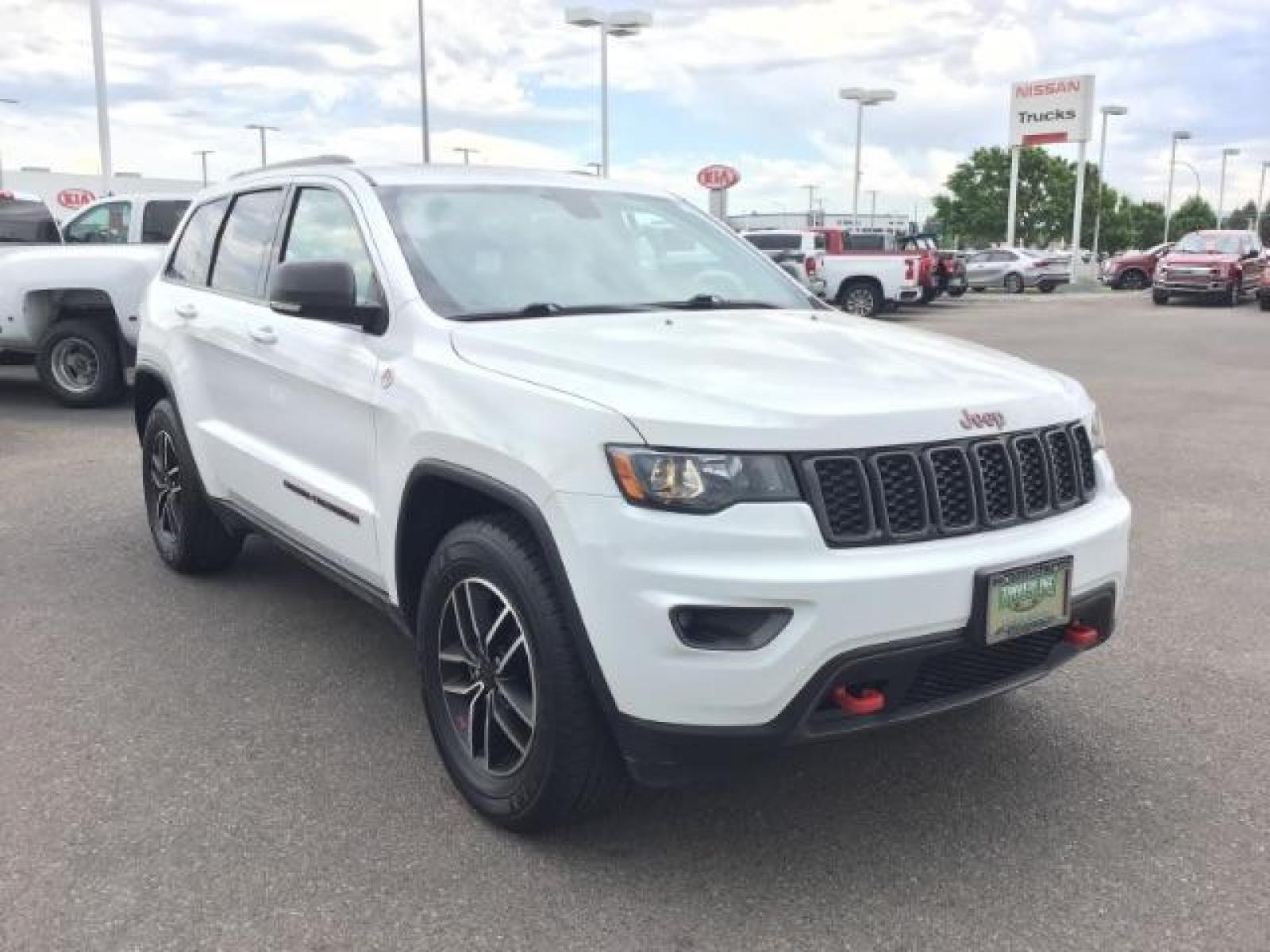 2020 Bright White Clear Coat /Black/Ruby Red, leather Jeep Grand Cherokee Trailhawk 4WD (1C4RJFLG5LC) with an 3.6L V6 DOHC 24V engine, 8-Speed Automatic transmission, located at 1235 N Woodruff Ave., Idaho Falls, 83401, (208) 523-1053, 43.507172, -112.000488 - Leather and loaded, heated and cooled seats, blind spot monitors, AWD, low miles. At Timberline Auto it is always easy to find a great deal on your next vehicle! Our experienced sales staff can help find the right vehicle that will fit your needs. Our knowledgeable finance department has options for - Photo #6