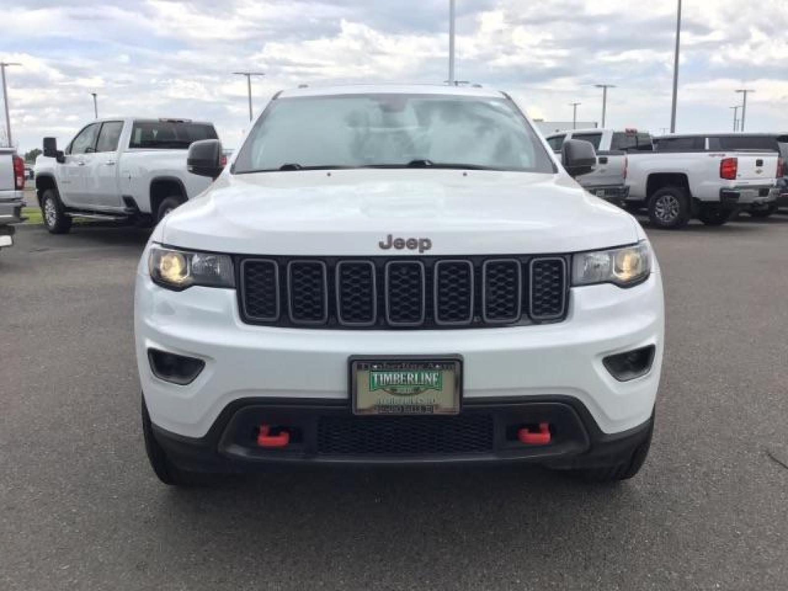 2020 Bright White Clear Coat /Black/Ruby Red, leather Jeep Grand Cherokee Trailhawk 4WD (1C4RJFLG5LC) with an 3.6L V6 DOHC 24V engine, 8-Speed Automatic transmission, located at 1235 N Woodruff Ave., Idaho Falls, 83401, (208) 523-1053, 43.507172, -112.000488 - Leather and loaded, heated and cooled seats, blind spot monitors, AWD, low miles. At Timberline Auto it is always easy to find a great deal on your next vehicle! Our experienced sales staff can help find the right vehicle that will fit your needs. Our knowledgeable finance department has options for - Photo #7