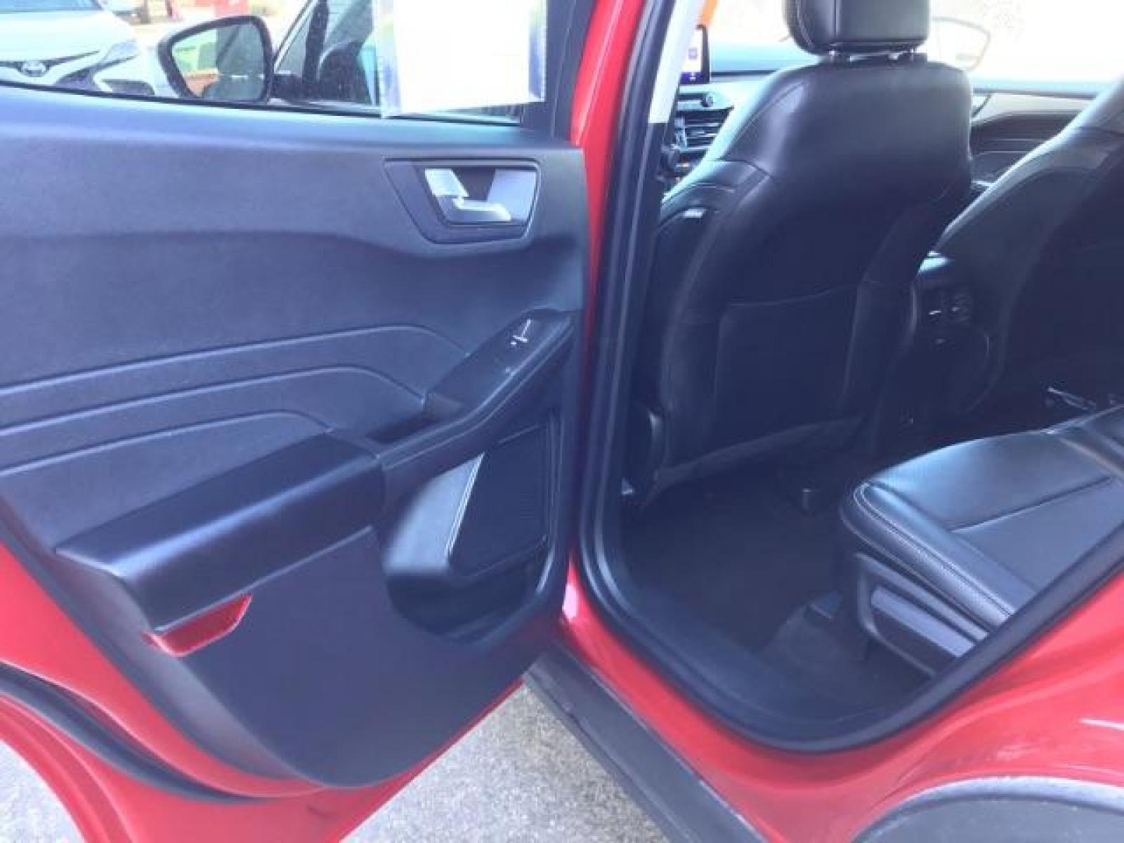 2021 Rapid Red Metallic Tinted Clearcoat /Ebony Ford Escape SEL AWD (1FMCU9H62MU) with an 1.5L L3 engine, 8-Speed Automatic transmission, located at 1235 N Woodruff Ave., Idaho Falls, 83401, (208) 523-1053, 43.507172, -112.000488 - 2021 Ford Escape SEL package with the 1.5L EcoBoost engine, heated seats, remote start, dual moonroof, and so much more! At Timberline Auto it is always easy to find a great deal on your next vehicle! Our experienced sales staff can help find the right vehicle that will fit your needs. Our knowled - Photo #13
