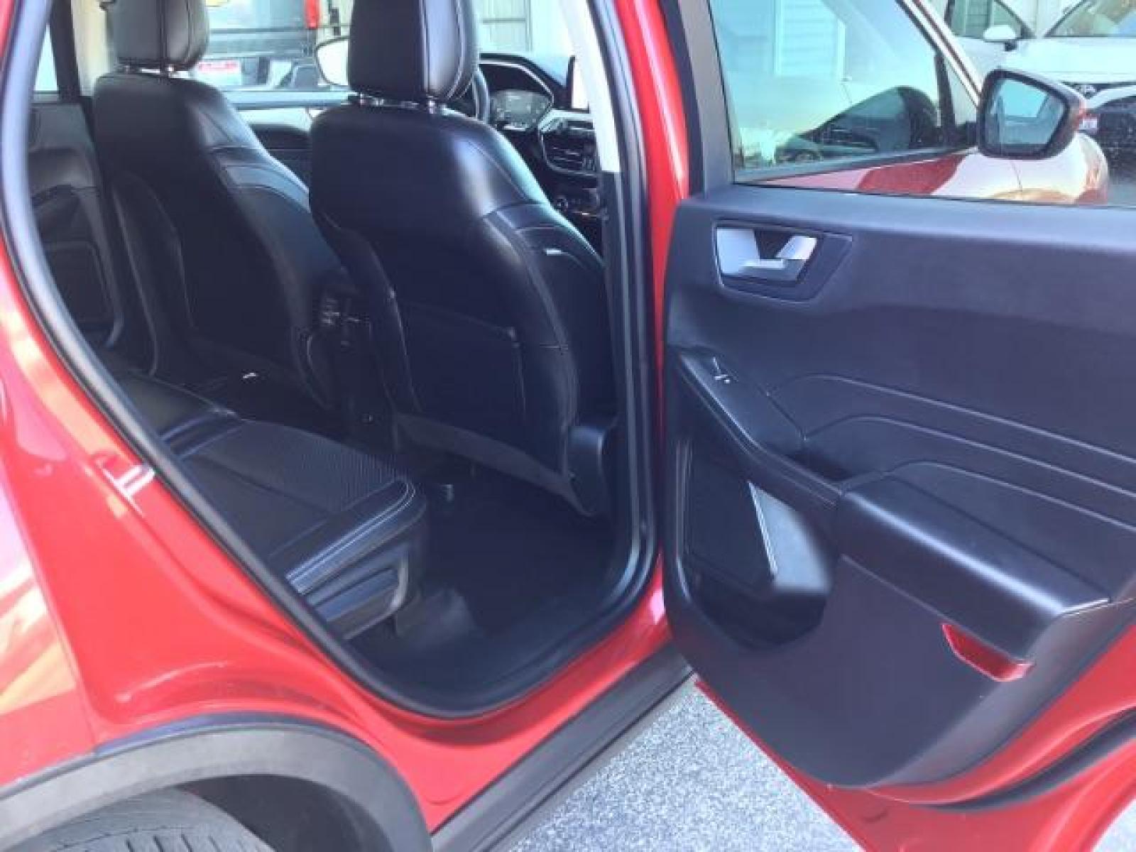 2021 Rapid Red Metallic Tinted Clearcoat /Ebony Ford Escape SEL AWD (1FMCU9H62MU) with an 1.5L L3 engine, 8-Speed Automatic transmission, located at 1235 N Woodruff Ave., Idaho Falls, 83401, (208) 523-1053, 43.507172, -112.000488 - 2021 Ford Escape SEL package with the 1.5L EcoBoost engine, heated seats, remote start, dual moonroof, and so much more! At Timberline Auto it is always easy to find a great deal on your next vehicle! Our experienced sales staff can help find the right vehicle that will fit your needs. Our knowled - Photo #17