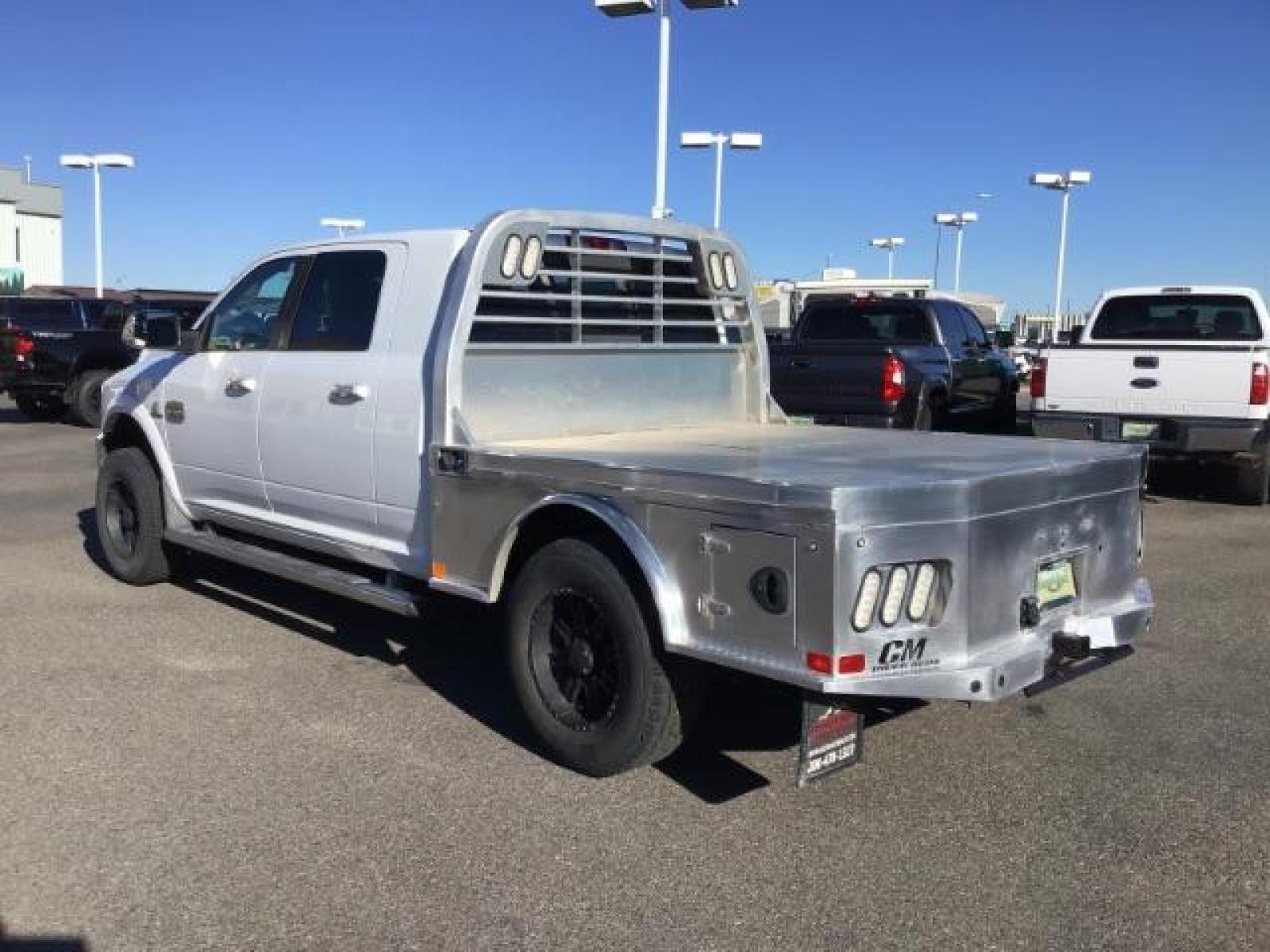 2015 Bright White Clear Coat /LEATHER RAM 2500 Longhorn Mega Cab SWB 4WD (3C6UR5PL9FG) with an 6.7L L6 OHV 24V TURBO DIESEL engine, 6-Speed Automatic transmission, located at 1235 N Woodruff Ave., Idaho Falls, 83401, (208) 523-1053, 43.507172, -112.000488 - This 2015 Ram 2500 Mega Cab Longhorn Edition, has the 6.7L Diesel motor. It has 159,423 miles. It comes with a flat bed, running boards, sunroof, heated and cooled seats, and rear heated seats. At Timberline Auto it is always easy to find a great deal on your next vehicle! Our experienced sales st - Photo #2