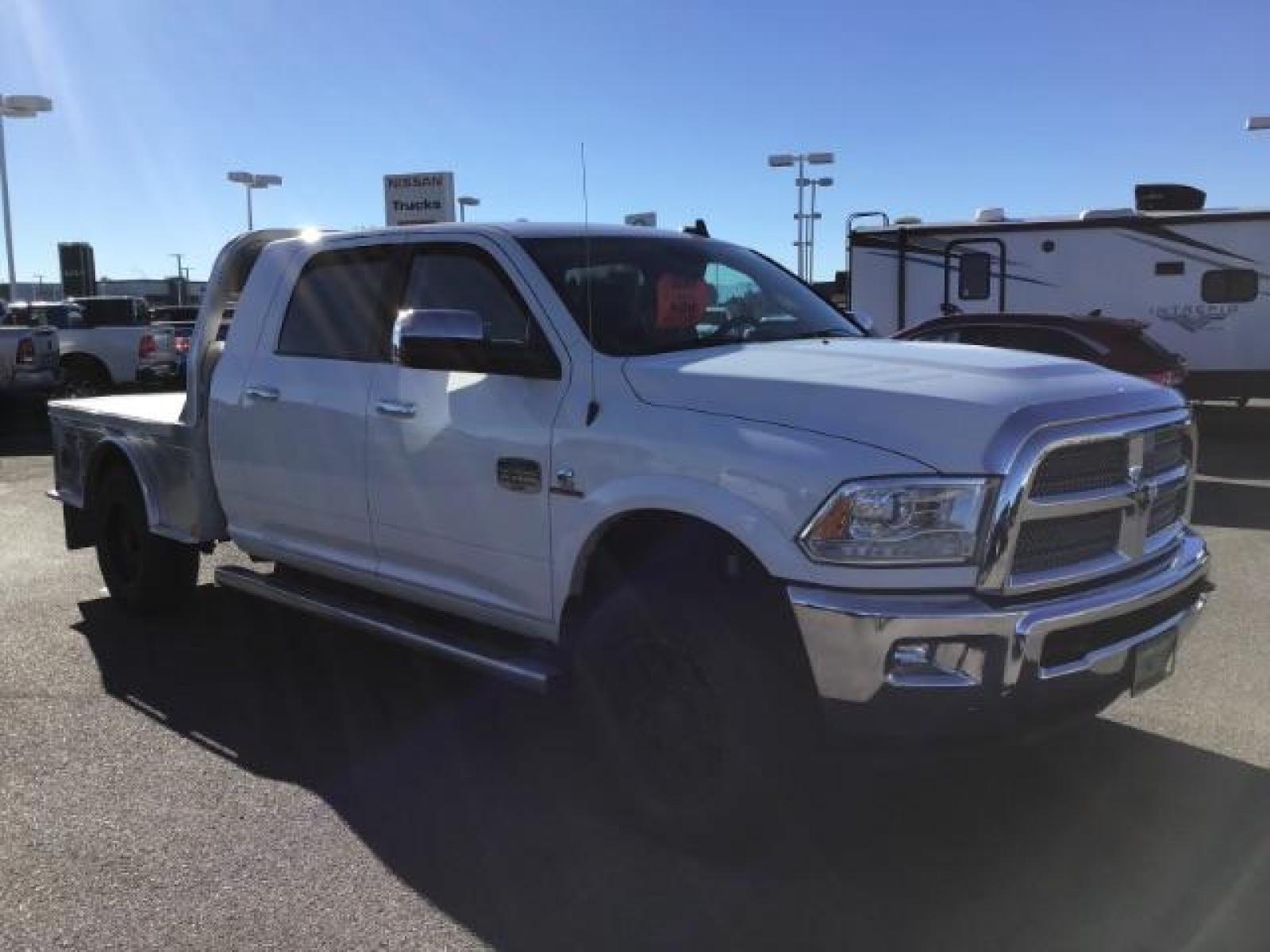 2015 Bright White Clear Coat /LEATHER RAM 2500 Longhorn Mega Cab SWB 4WD (3C6UR5PL9FG) with an 6.7L L6 OHV 24V TURBO DIESEL engine, 6-Speed Automatic transmission, located at 1235 N Woodruff Ave., Idaho Falls, 83401, (208) 523-1053, 43.507172, -112.000488 - This 2015 Ram 2500 Mega Cab Longhorn Edition, has the 6.7L Diesel motor. It has 159,423 miles. It comes with a flat bed, running boards, sunroof, heated and cooled seats, and rear heated seats. At Timberline Auto it is always easy to find a great deal on your next vehicle! Our experienced sales st - Photo #6