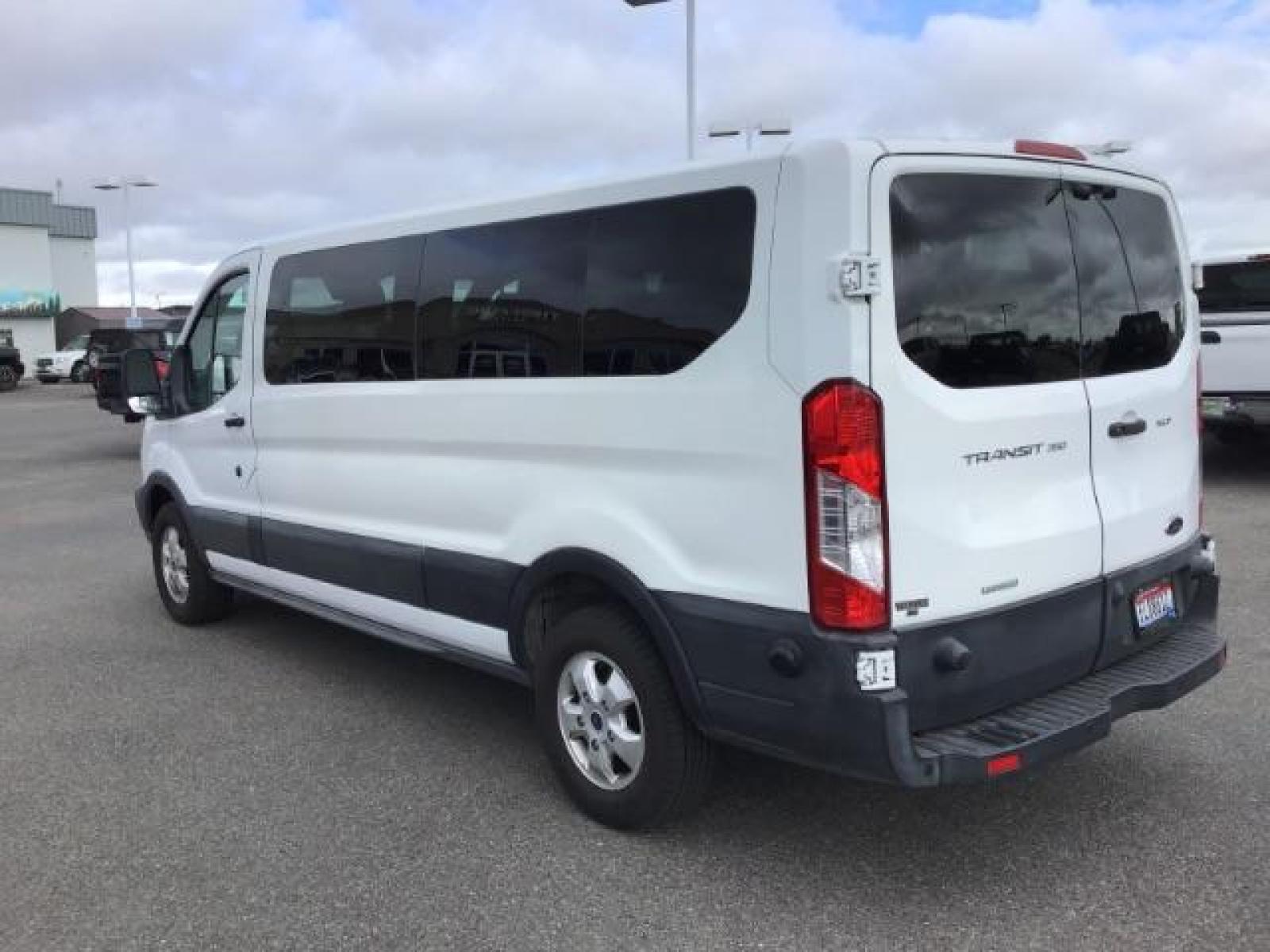 2018 WHITE /XL Ford Transit 350 Wagon Low Roof XL w/Sliding Pass. 148-in. WB (1FBZX2YG2JK) with an 3.5L V6 DOHC 24V engine, 6-Speed Automatic transmission, located at 1235 N Woodruff Ave., Idaho Falls, 83401, (208) 523-1053, 43.507172, -112.000488 - Photo #2
