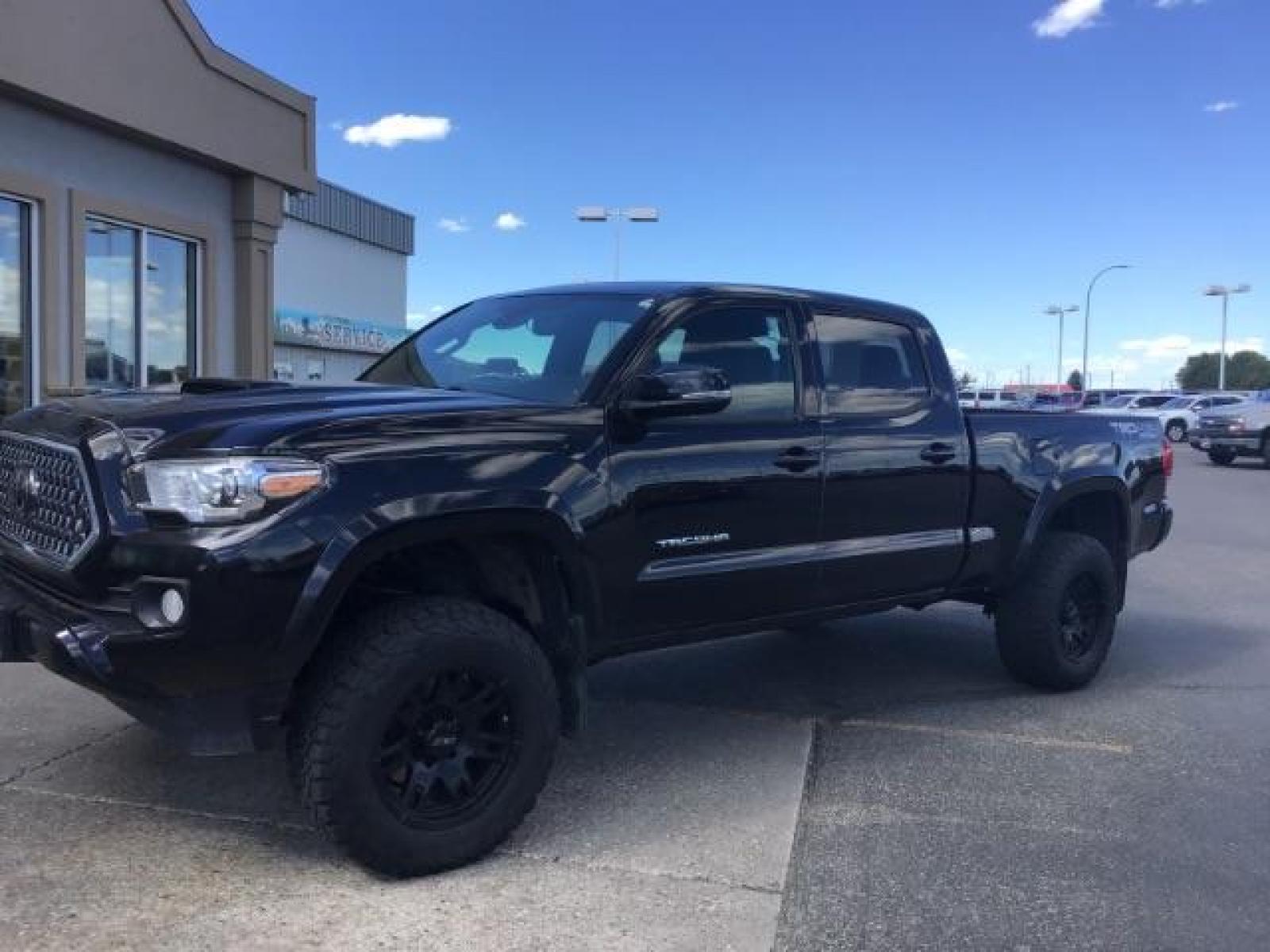 2018 Midnight Black Metallic /LEATHER Toyota Tacoma SR5 Double Cab Super Long Bed V6 6AT 4WD (5TFDZ5BN9JX) with an 3.5L V6 DOHC 24V engine, 6-Speed Automatic transmission, located at 1235 N Woodruff Ave., Idaho Falls, 83401, (208) 523-1053, 43.507172, -112.000488 - Crew cab, long box, 4X4, leather interior, heated seats, power sliding rear window, factory bed liner, TRD Sport package, full size spare tire, complete front clear bra. Hard to find! - Photo #0