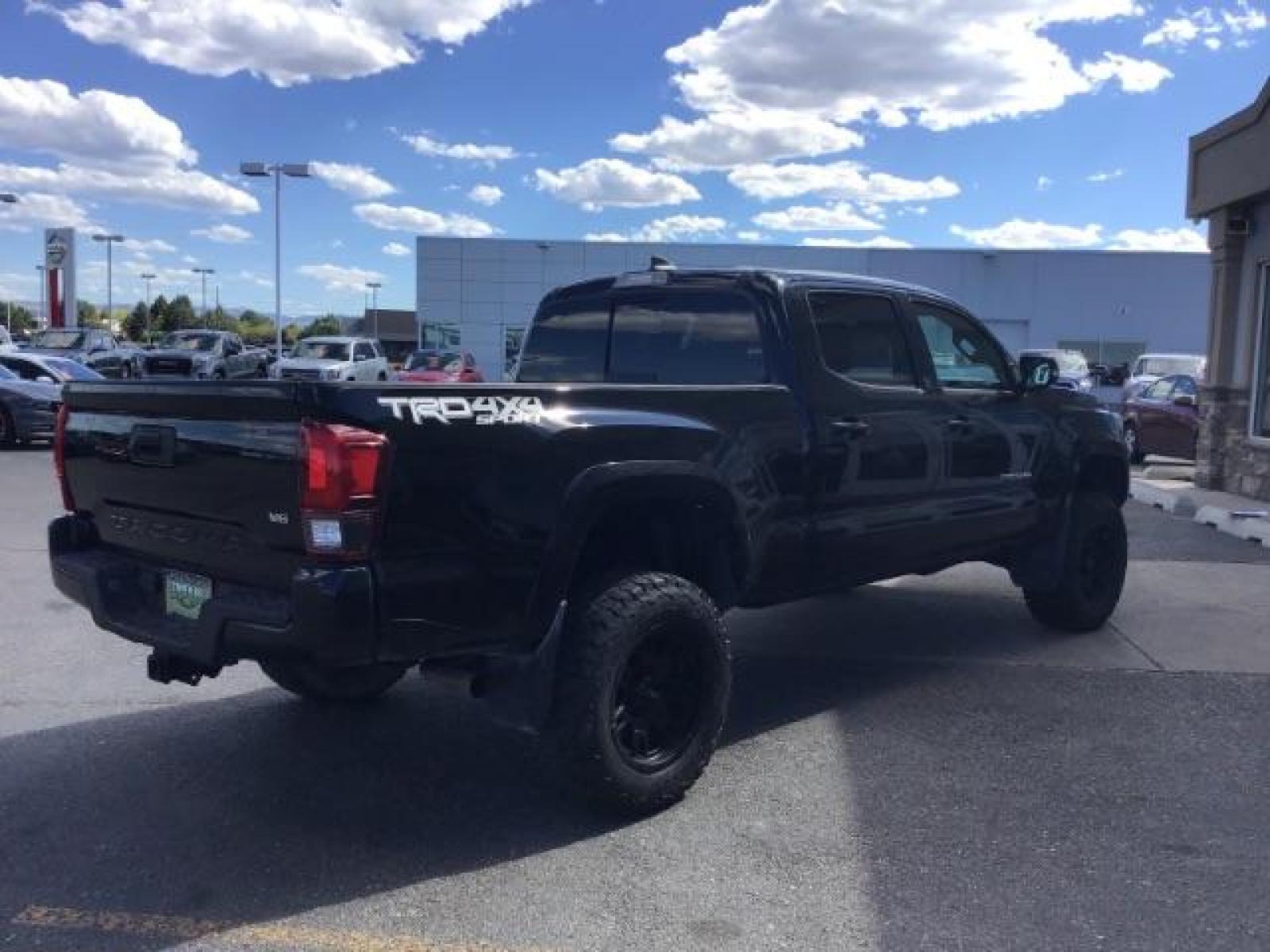 2018 Midnight Black Metallic /LEATHER Toyota Tacoma SR5 Double Cab Super Long Bed V6 6AT 4WD (5TFDZ5BN9JX) with an 3.5L V6 DOHC 24V engine, 6-Speed Automatic transmission, located at 1235 N Woodruff Ave., Idaho Falls, 83401, (208) 523-1053, 43.507172, -112.000488 - Crew cab, long box, 4X4, leather interior, heated seats, power sliding rear window, factory bed liner, TRD Sport package, full size spare tire, complete front clear bra. Hard to find! - Photo #4