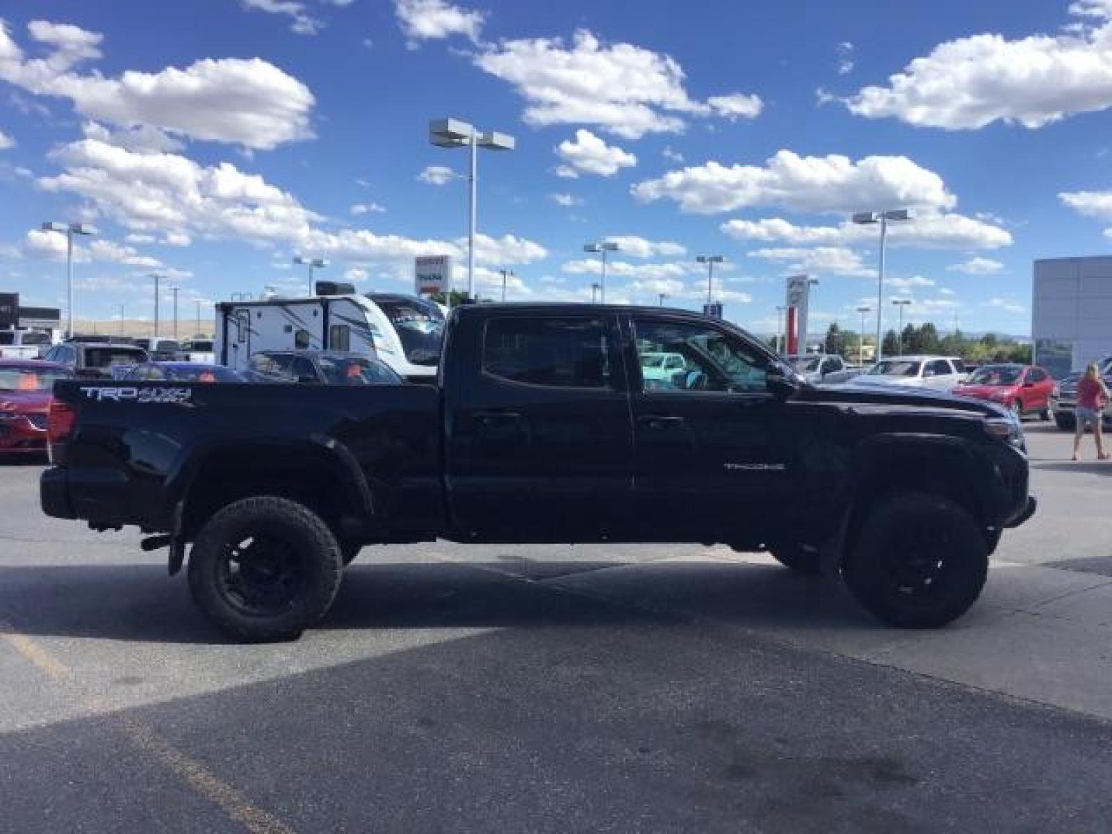 2018 Midnight Black Metallic /LEATHER Toyota Tacoma SR5 Double Cab Super Long Bed V6 6AT 4WD (5TFDZ5BN9JX) with an 3.5L V6 DOHC 24V engine, 6-Speed Automatic transmission, located at 1235 N Woodruff Ave., Idaho Falls, 83401, (208) 523-1053, 43.507172, -112.000488 - Crew cab, long box, 4X4, leather interior, heated seats, power sliding rear window, factory bed liner, TRD Sport package, full size spare tire, complete front clear bra. Hard to find! - Photo #5