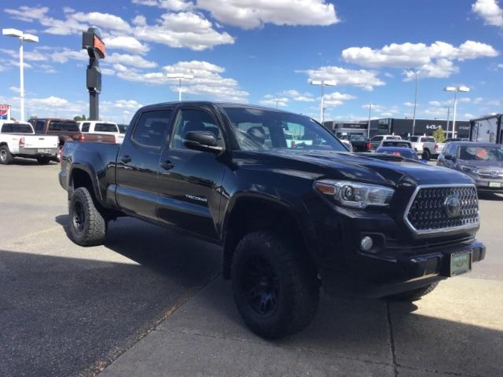 2018 Midnight Black Metallic /LEATHER Toyota Tacoma SR5 Double Cab Super Long Bed V6 6AT 4WD (5TFDZ5BN9JX) with an 3.5L V6 DOHC 24V engine, 6-Speed Automatic transmission, located at 1235 N Woodruff Ave., Idaho Falls, 83401, (208) 523-1053, 43.507172, -112.000488 - Crew cab, long box, 4X4, leather interior, heated seats, power sliding rear window, factory bed liner, TRD Sport package, full size spare tire, complete front clear bra. Hard to find! - Photo #6