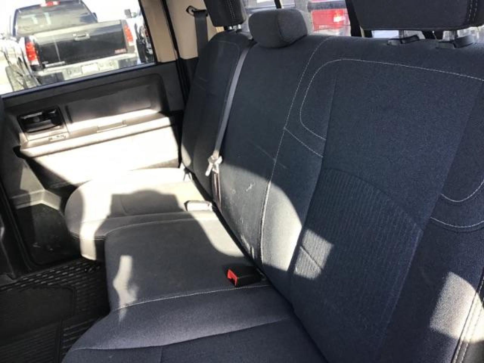 2020 BLACK /CLOTH RAM 3500 Tradesman Crew Cab 4WD DRW (3C63RRGL3LG) with an 6.7L L6 OHV 24V TURBO DIESEL engine, 6-Speed Automatic transmission, located at 1235 N Woodruff Ave., Idaho Falls, 83401, (208) 523-1053, 43.507172, -112.000488 - this 2020 Ram 3500 SLT, has a 6.7L Diesel motor. It has 105,000 miles. It comes with a flatbed with turnover ball. Comes with cloth interior, blue tooth audio, power door locks, power windows and integrated brake control. At Timberline Auto it is always easy to find a great deal on your next vehicle - Photo #20