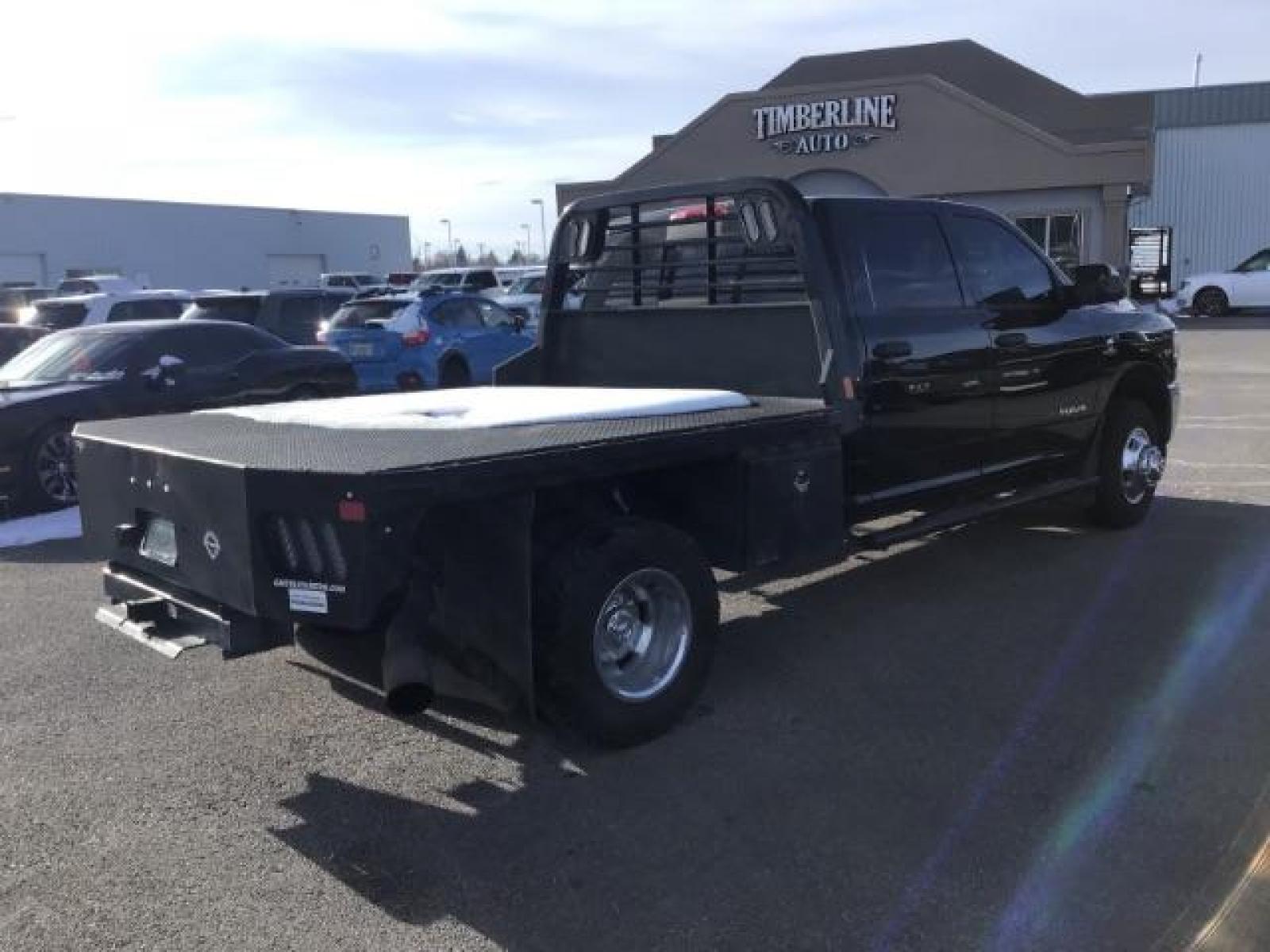 2020 BLACK /CLOTH RAM 3500 Tradesman Crew Cab 4WD DRW (3C63RRGL3LG) with an 6.7L L6 OHV 24V TURBO DIESEL engine, 6-Speed Automatic transmission, located at 1235 N Woodruff Ave., Idaho Falls, 83401, (208) 523-1053, 43.507172, -112.000488 - this 2020 Ram 3500 SLT, has a 6.7L Diesel motor. It has 105,000 miles. It comes with a flatbed with turnover ball. Comes with cloth interior, blue tooth audio, power door locks, power windows and integrated brake control. At Timberline Auto it is always easy to find a great deal on your next vehicle - Photo #4