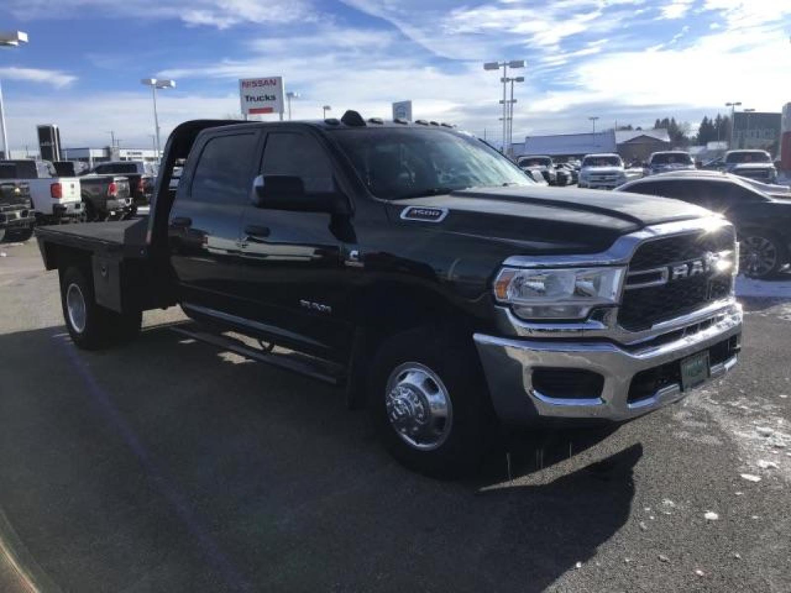 2020 BLACK /CLOTH RAM 3500 Tradesman Crew Cab 4WD DRW (3C63RRGL3LG) with an 6.7L L6 OHV 24V TURBO DIESEL engine, 6-Speed Automatic transmission, located at 1235 N Woodruff Ave., Idaho Falls, 83401, (208) 523-1053, 43.507172, -112.000488 - this 2020 Ram 3500 SLT, has a 6.7L Diesel motor. It has 105,000 miles. It comes with a flatbed with turnover ball. Comes with cloth interior, blue tooth audio, power door locks, power windows and integrated brake control. At Timberline Auto it is always easy to find a great deal on your next vehicle - Photo #6