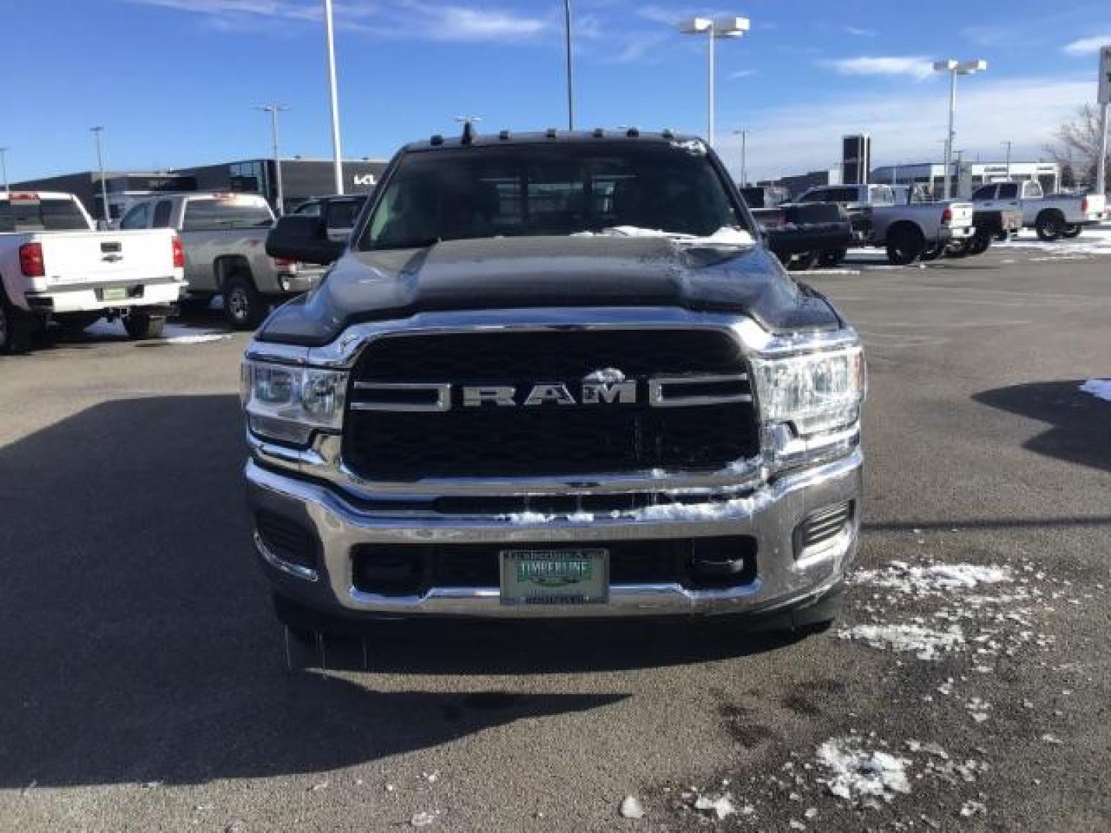 2020 BLACK /CLOTH RAM 3500 Tradesman Crew Cab 4WD DRW (3C63RRGL3LG) with an 6.7L L6 OHV 24V TURBO DIESEL engine, 6-Speed Automatic transmission, located at 1235 N Woodruff Ave., Idaho Falls, 83401, (208) 523-1053, 43.507172, -112.000488 - this 2020 Ram 3500 SLT, has a 6.7L Diesel motor. It has 105,000 miles. It comes with a flatbed with turnover ball. Comes with cloth interior, blue tooth audio, power door locks, power windows and integrated brake control. At Timberline Auto it is always easy to find a great deal on your next vehicle - Photo #7