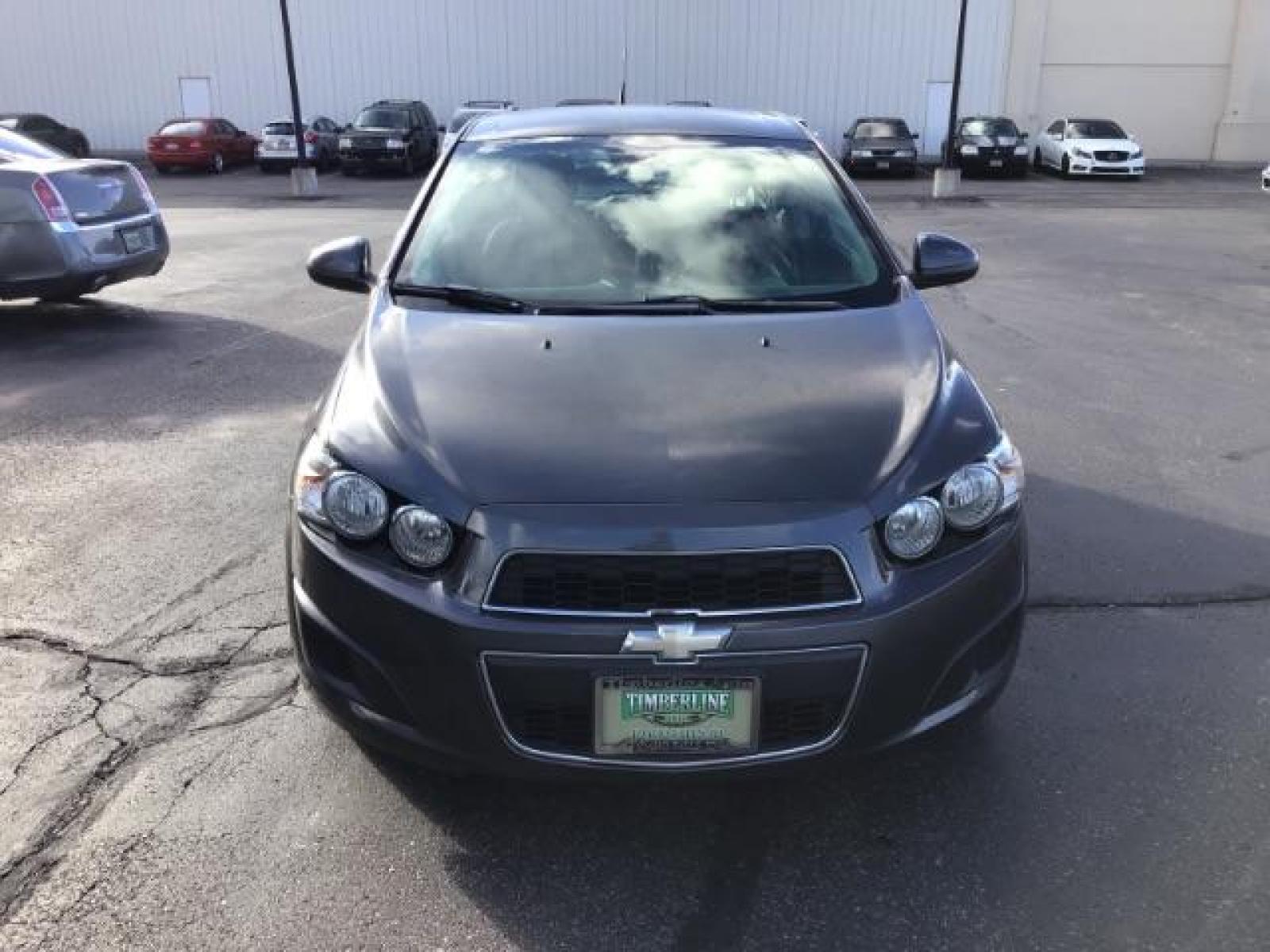 2013 Black Granite Metallic Chevrolet Sonic LT Auto 5-Door (1G1JC6SG7D4) with an 1.8L L4 DOHC 24V engine, 6-Speed Automatic transmission, located at 1235 N Woodruff Ave., Idaho Falls, 83401, (208) 523-1053, 43.507172, -112.000488 - This 2013 Chevrolet Sonic, has the 4 cylinder motor. It has 95,000 miles. It comes with Steering wheel audio controls, cruise control, bluetooth audio, and CD player. At Timberline Auto it is always easy to find a great deal on your next vehicle! Our experienced sales staff can help find the right v - Photo #7