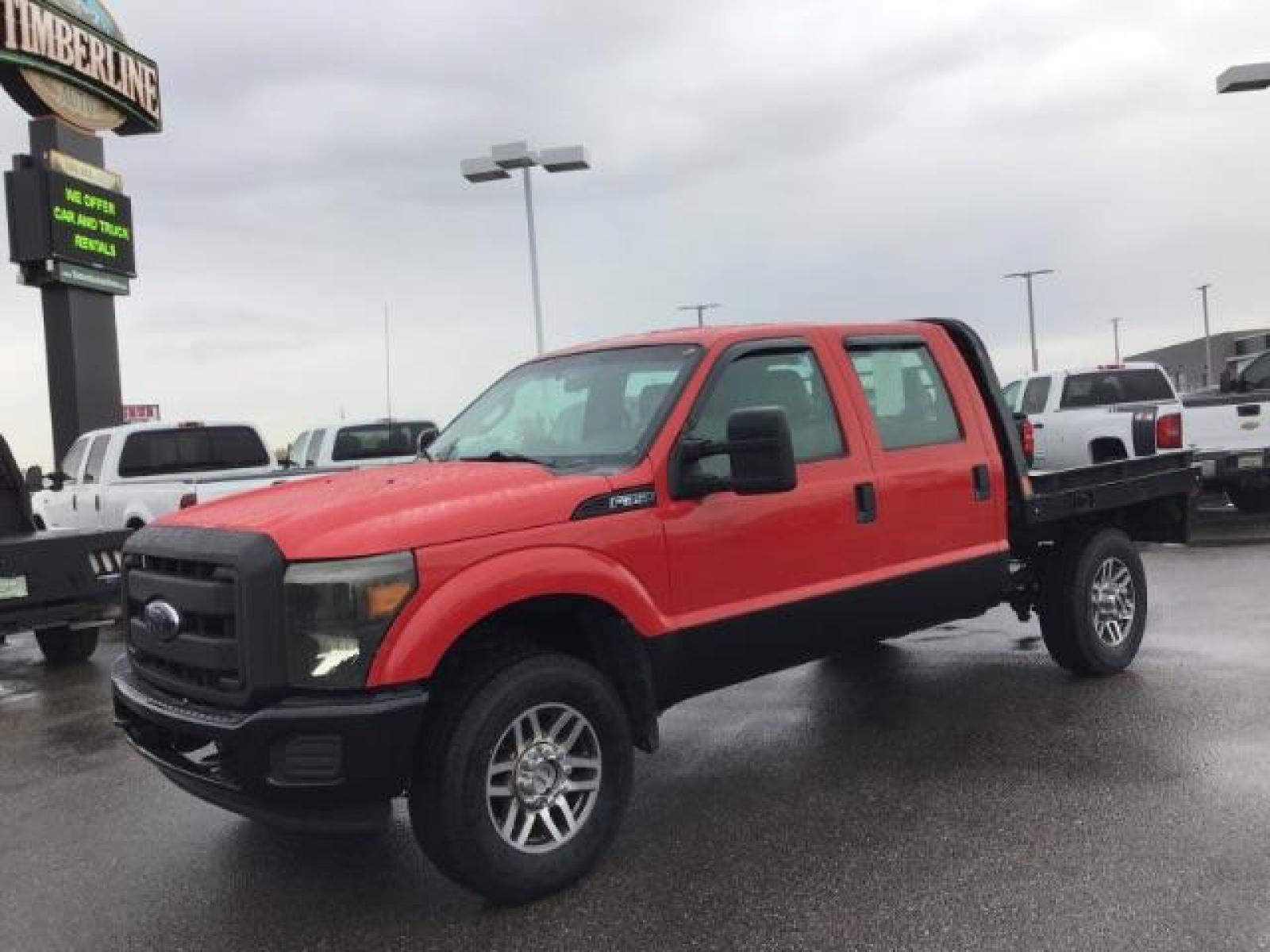 2013 Vermillion Red /Steel Vinyl Interior Ford F-350 SD XL Crew Cab 4WD (1FT8W3B60DE) with an 6.2L V8 OHV 16V engine, 6-Speed Automatic transmission, located at 1235 N Woodruff Ave., Idaho Falls, 83401, (208) 523-1053, 43.507172, -112.000488 - This 2013 Ford F350 XL. Has the 6.2L V8 motor. It only has 99,446 miles. It has the Flat bed, and plenty of room to haul people around. At Timberline Auto it is always easy to find a great deal on your next vehicle! Our experienced sales staff can help find the right vehicle that will fit your needs - Photo #0