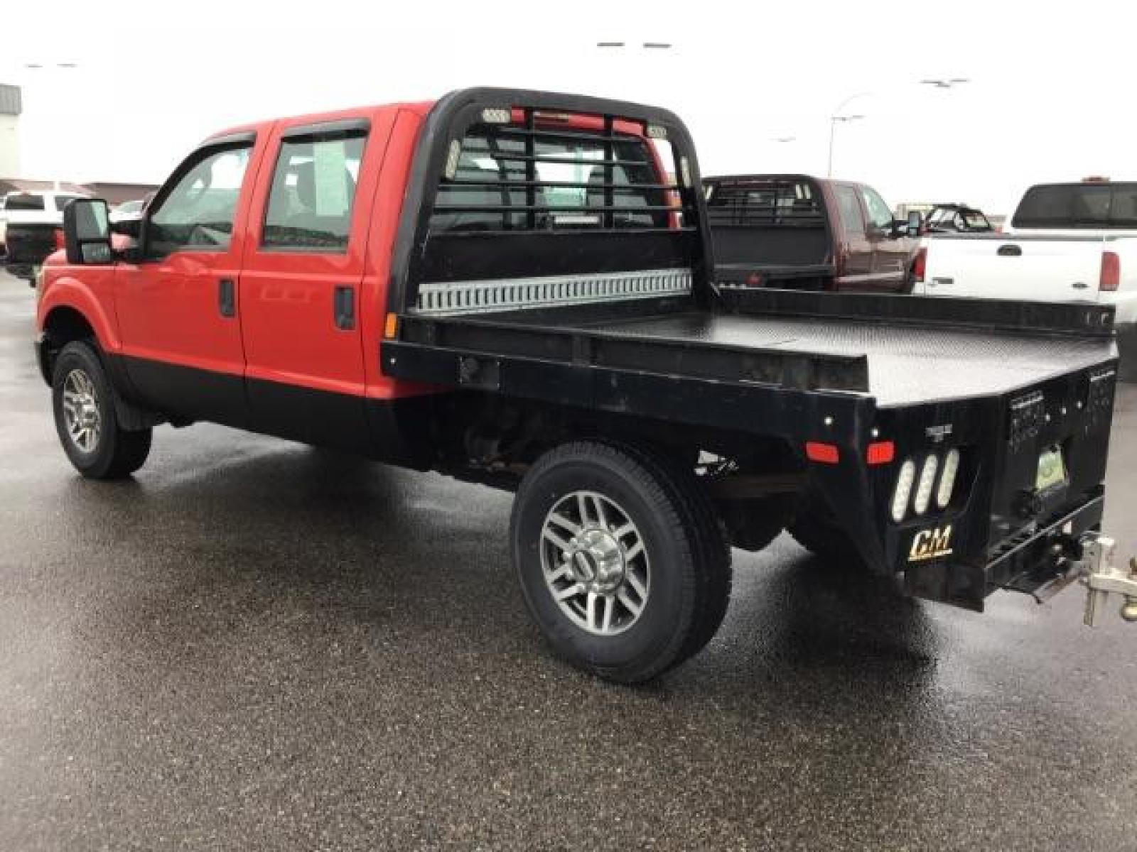 2013 Vermillion Red /Steel Vinyl Interior Ford F-350 SD XL Crew Cab 4WD (1FT8W3B60DE) with an 6.2L V8 OHV 16V engine, 6-Speed Automatic transmission, located at 1235 N Woodruff Ave., Idaho Falls, 83401, (208) 523-1053, 43.507172, -112.000488 - This 2013 Ford F350 XL. Has the 6.2L V8 motor. It only has 99,446 miles. It has the Flat bed, and plenty of room to haul people around. At Timberline Auto it is always easy to find a great deal on your next vehicle! Our experienced sales staff can help find the right vehicle that will fit your needs - Photo #2