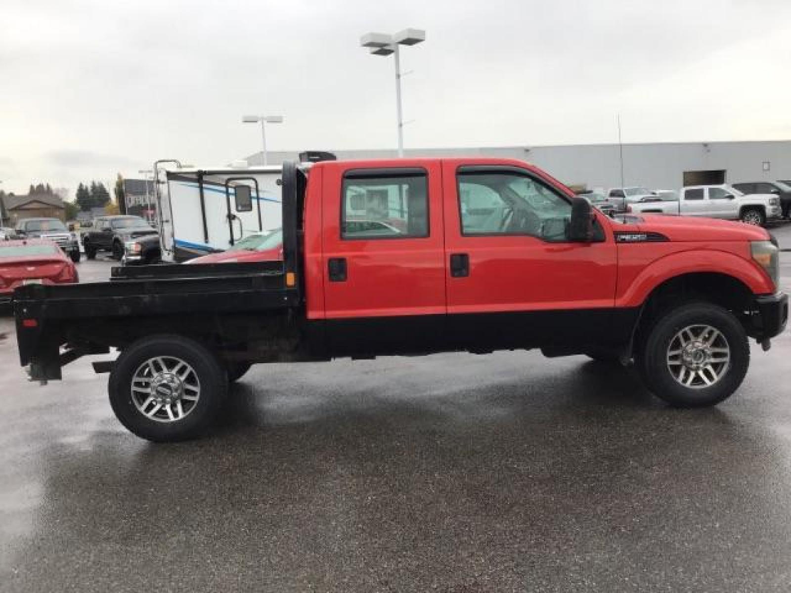2013 Vermillion Red /Steel Vinyl Interior Ford F-350 SD XL Crew Cab 4WD (1FT8W3B60DE) with an 6.2L V8 OHV 16V engine, 6-Speed Automatic transmission, located at 1235 N Woodruff Ave., Idaho Falls, 83401, (208) 523-1053, 43.507172, -112.000488 - This 2013 Ford F350 XL. Has the 6.2L V8 motor. It only has 99,446 miles. It has the Flat bed, and plenty of room to haul people around. At Timberline Auto it is always easy to find a great deal on your next vehicle! Our experienced sales staff can help find the right vehicle that will fit your needs - Photo #5