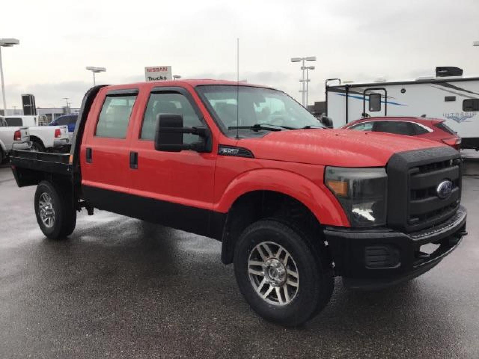 2013 Vermillion Red /Steel Vinyl Interior Ford F-350 SD XL Crew Cab 4WD (1FT8W3B60DE) with an 6.2L V8 OHV 16V engine, 6-Speed Automatic transmission, located at 1235 N Woodruff Ave., Idaho Falls, 83401, (208) 523-1053, 43.507172, -112.000488 - This 2013 Ford F350 XL. Has the 6.2L V8 motor. It only has 99,446 miles. It has the Flat bed, and plenty of room to haul people around. At Timberline Auto it is always easy to find a great deal on your next vehicle! Our experienced sales staff can help find the right vehicle that will fit your needs - Photo #6