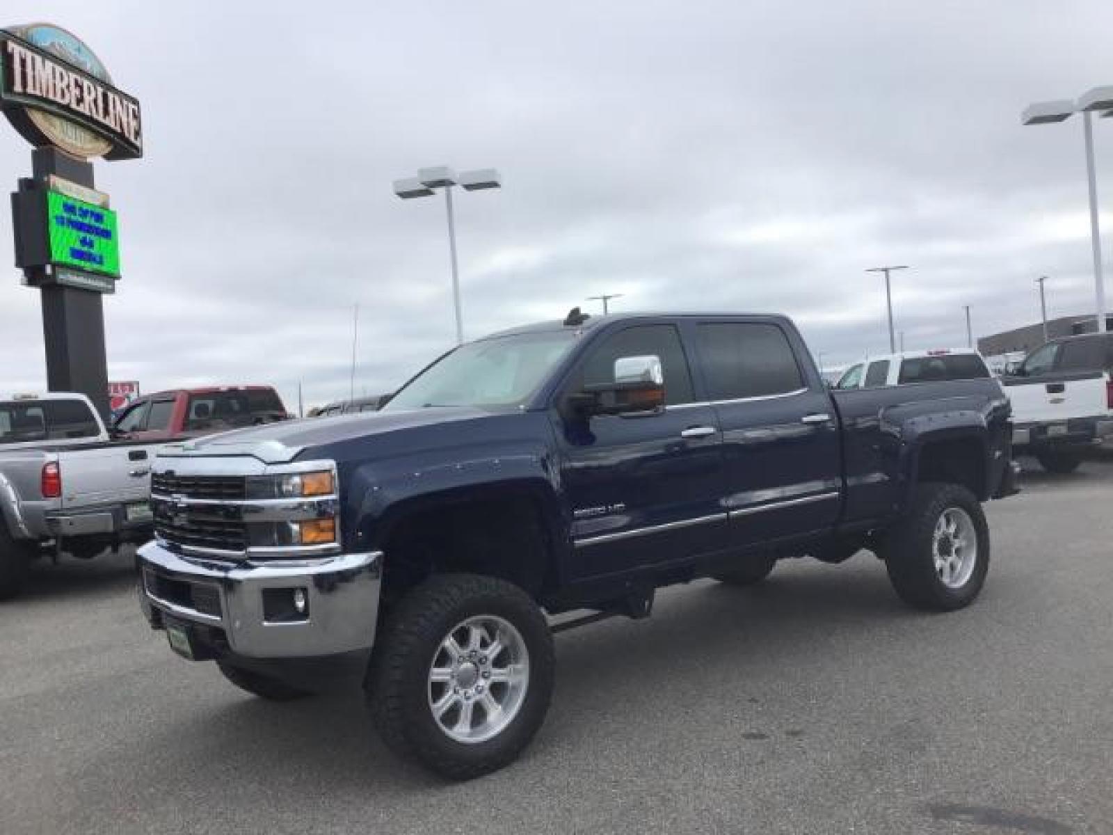 2016 Deep Ocean Blue Metallic /Cocoa/Dune, leather Chevrolet Silverado 3500HD LTZ Crew Cab 4WD (1GC4K0C86GF) with an 6.6L V8 OHV 32V TURBO DIESEL engine, 6-Speed Automatic transmission, located at 1235 N Woodruff Ave., Idaho Falls, 83401, (208) 523-1053, 43.507172, -112.000488 - This 2016 Chevrolet 3500 LTZ, has the 6.6L diesel motor. It has 160,031 miles. It comes with leather interior, tinted windows, back up camera, bluetooth, integrated trailer brake, and spray in bed liner. At Timberline Auto it is always easy to find a great deal on your next vehicle! Our experienced - Photo #0