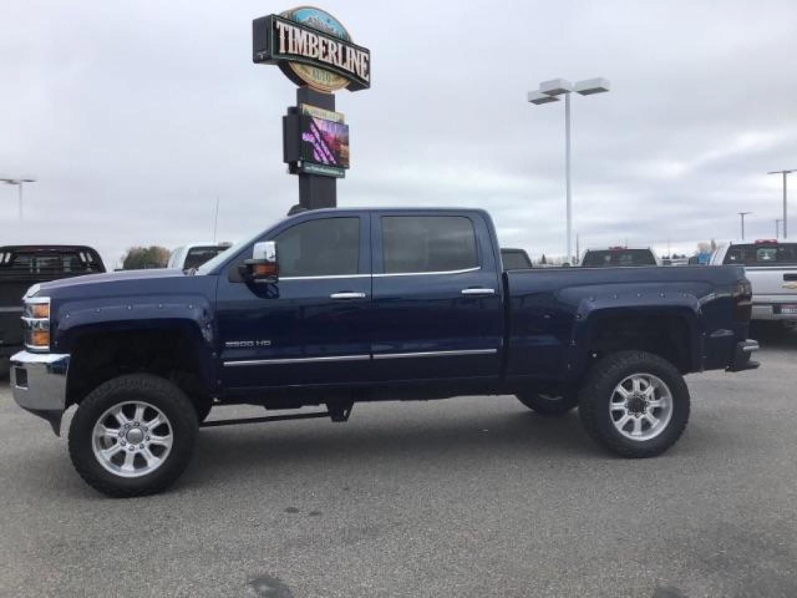 2016 Deep Ocean Blue Metallic /Cocoa/Dune, leather Chevrolet Silverado 3500HD LTZ Crew Cab 4WD (1GC4K0C86GF) with an 6.6L V8 OHV 32V TURBO DIESEL engine, 6-Speed Automatic transmission, located at 1235 N Woodruff Ave., Idaho Falls, 83401, (208) 523-1053, 43.507172, -112.000488 - This 2016 Chevrolet 3500 LTZ, has the 6.6L diesel motor. It has 160,031 miles. It comes with leather interior, tinted windows, back up camera, bluetooth, integrated trailer brake, and spray in bed liner. At Timberline Auto it is always easy to find a great deal on your next vehicle! Our experienced - Photo #1