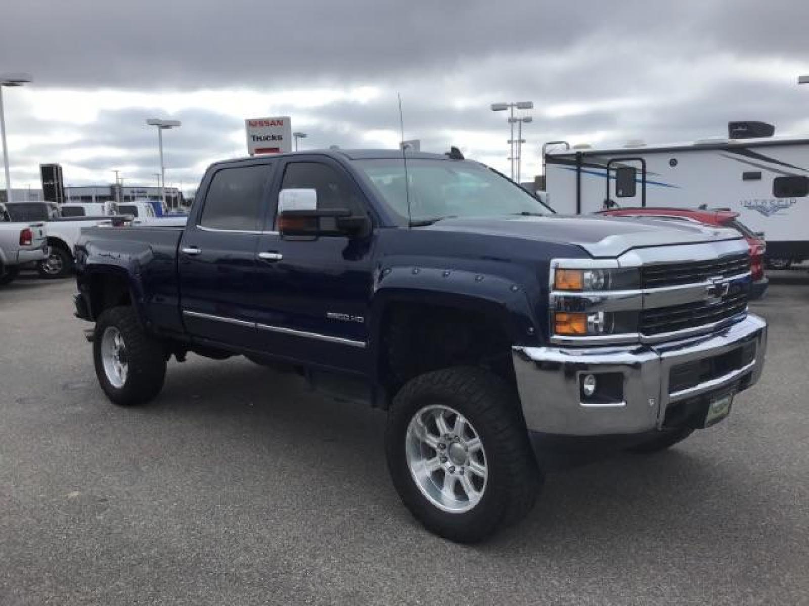 2016 Deep Ocean Blue Metallic /Cocoa/Dune, leather Chevrolet Silverado 3500HD LTZ Crew Cab 4WD (1GC4K0C86GF) with an 6.6L V8 OHV 32V TURBO DIESEL engine, 6-Speed Automatic transmission, located at 1235 N Woodruff Ave., Idaho Falls, 83401, (208) 523-1053, 43.507172, -112.000488 - This 2016 Chevrolet 3500 LTZ, has the 6.6L diesel motor. It has 160,031 miles. It comes with leather interior, tinted windows, back up camera, bluetooth, integrated trailer brake, and spray in bed liner. At Timberline Auto it is always easy to find a great deal on your next vehicle! Our experienced - Photo #6