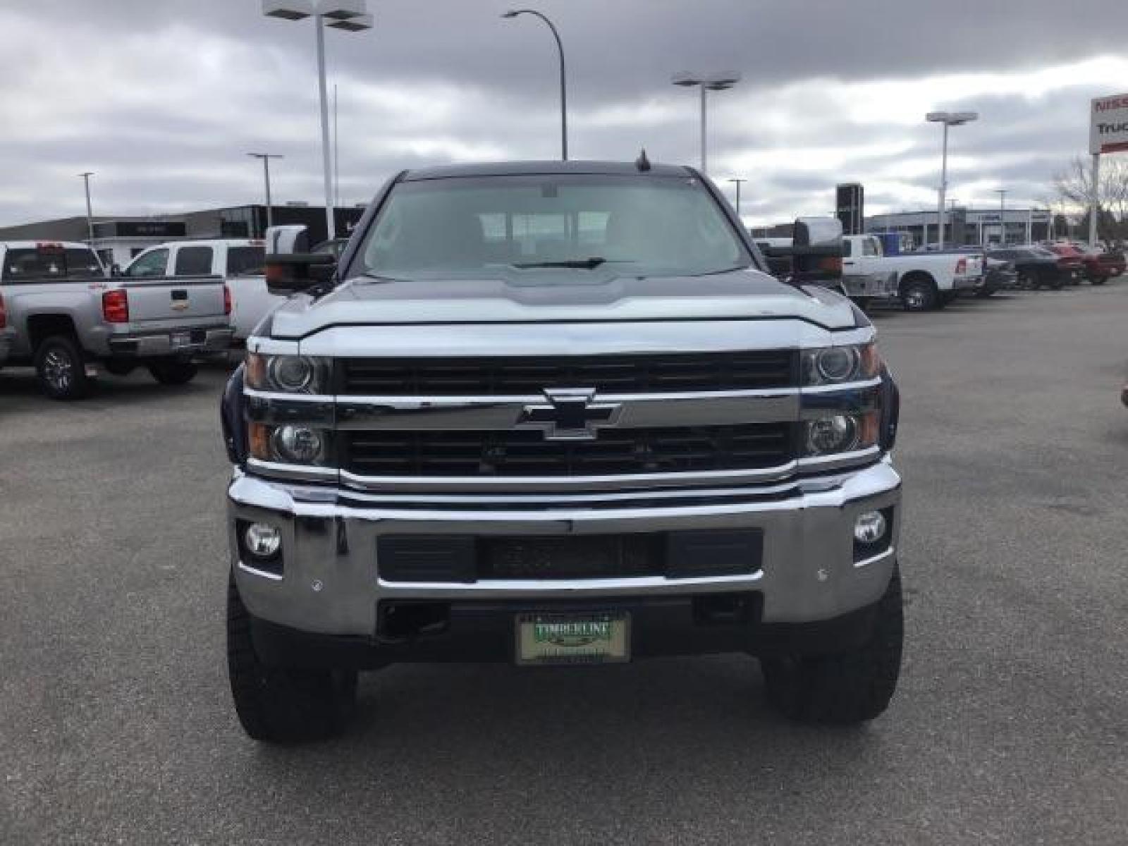2016 Deep Ocean Blue Metallic /Cocoa/Dune, leather Chevrolet Silverado 3500HD LTZ Crew Cab 4WD (1GC4K0C86GF) with an 6.6L V8 OHV 32V TURBO DIESEL engine, 6-Speed Automatic transmission, located at 1235 N Woodruff Ave., Idaho Falls, 83401, (208) 523-1053, 43.507172, -112.000488 - This 2016 Chevrolet 3500 LTZ, has the 6.6L diesel motor. It has 160,031 miles. It comes with leather interior, tinted windows, back up camera, bluetooth, integrated trailer brake, and spray in bed liner. At Timberline Auto it is always easy to find a great deal on your next vehicle! Our experienced - Photo #7