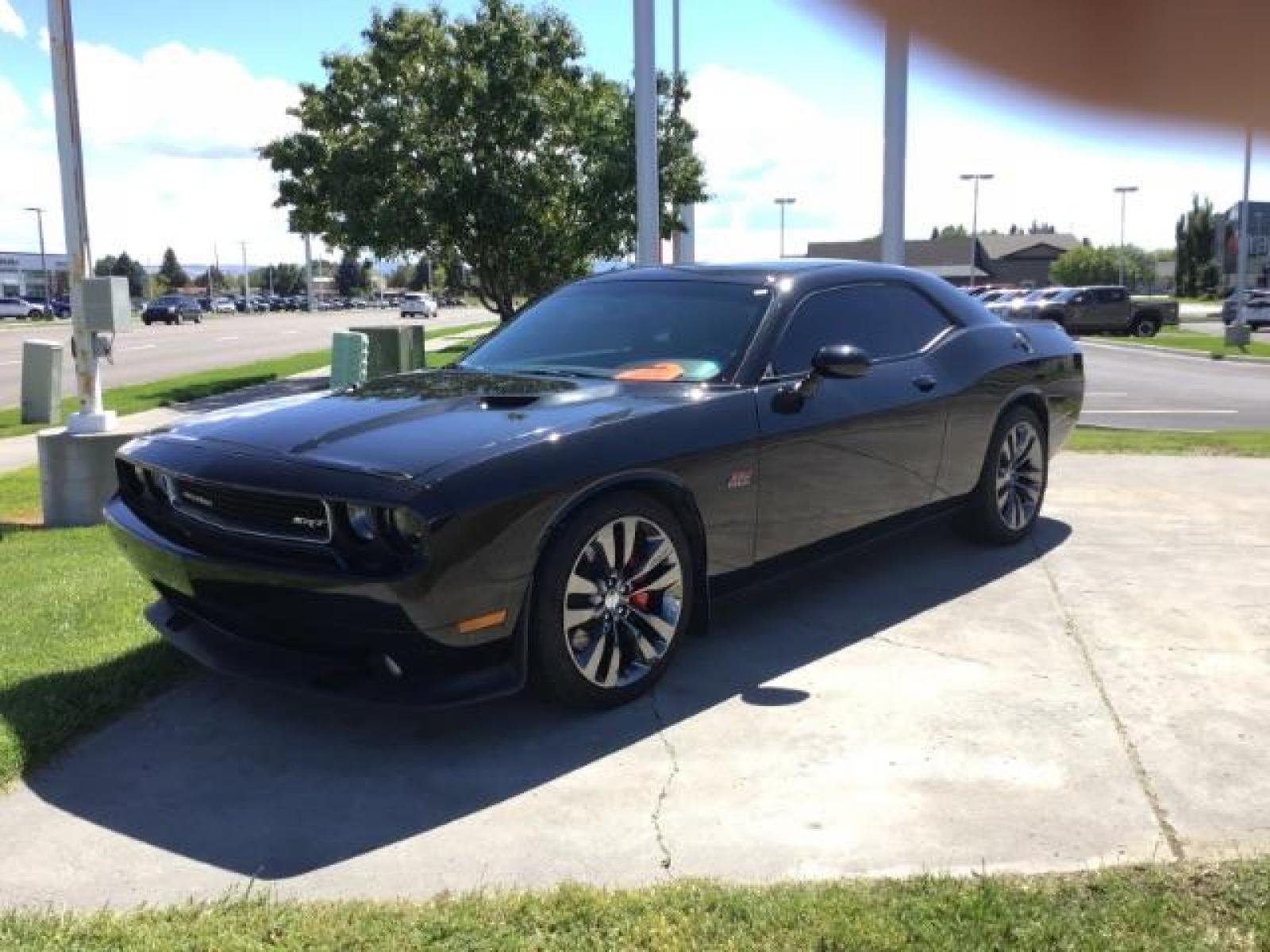 2014 Black Clearcoat /Radar Red/Dk Slate Gray Dodge Challenger SRT8 (2C3CDYCJ5EH) with an 6.4L V8 OHV 16V engine, 5-Speed Automatic transmission, located at 1235 N Woodruff Ave., Idaho Falls, 83401, (208) 523-1053, 43.507172, -112.000488 - SRT8, 392 Hemi, leather, automatic transmission,, heated seats, sunroof, multiple charge and USB ports, navigation, heated steering wheel, park assist, very low miles. At Timberline Auto it is always easy to find a great deal on your next vehicle! Our experienced sales staff can help find the right - Photo #0