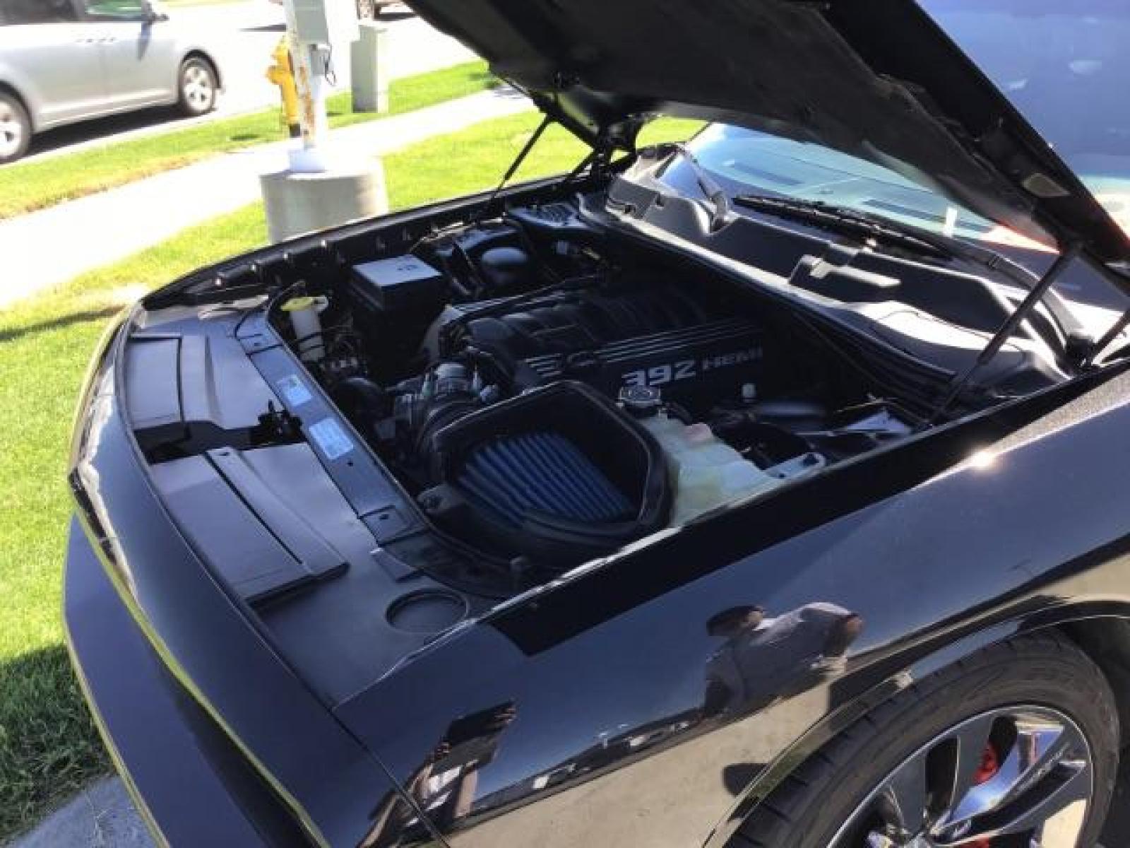 2014 Black Clearcoat /Radar Red/Dk Slate Gray Dodge Challenger SRT8 (2C3CDYCJ5EH) with an 6.4L V8 OHV 16V engine, 5-Speed Automatic transmission, located at 1235 N Woodruff Ave., Idaho Falls, 83401, (208) 523-1053, 43.507172, -112.000488 - SRT8, 392 Hemi, leather, automatic transmission,, heated seats, sunroof, multiple charge and USB ports, navigation, heated steering wheel, park assist, very low miles. At Timberline Auto it is always easy to find a great deal on your next vehicle! Our experienced sales staff can help find the right - Photo #15