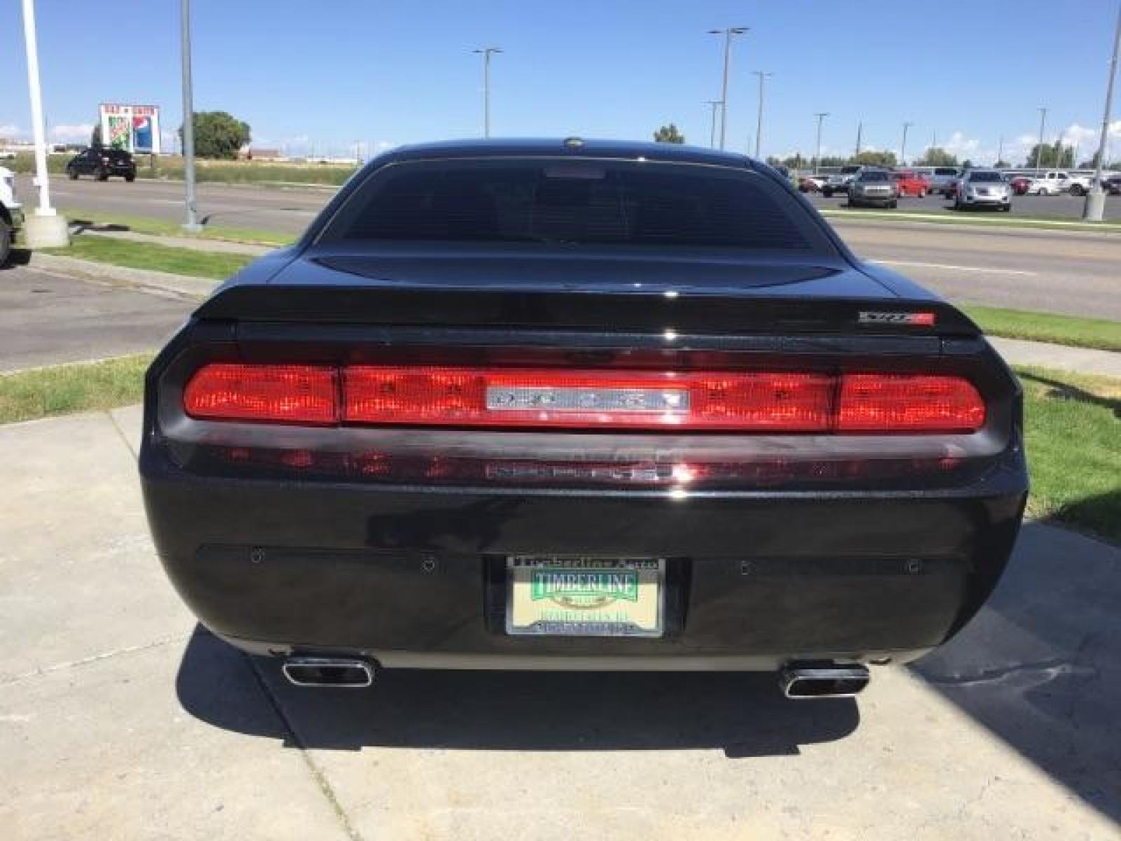 2014 Black Clearcoat /Radar Red/Dk Slate Gray Dodge Challenger SRT8 (2C3CDYCJ5EH) with an 6.4L V8 OHV 16V engine, 5-Speed Automatic transmission, located at 1235 N Woodruff Ave., Idaho Falls, 83401, (208) 523-1053, 43.507172, -112.000488 - SRT8, 392 Hemi, leather, automatic transmission,, heated seats, sunroof, multiple charge and USB ports, navigation, heated steering wheel, park assist, very low miles. At Timberline Auto it is always easy to find a great deal on your next vehicle! Our experienced sales staff can help find the right - Photo #3